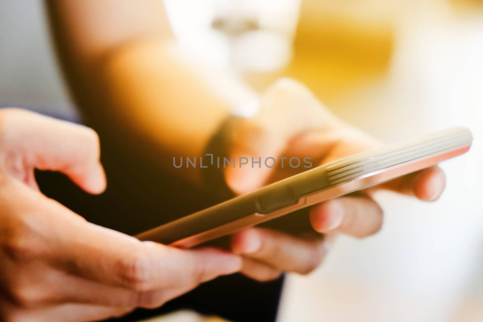 Girl hand holding a smart phone