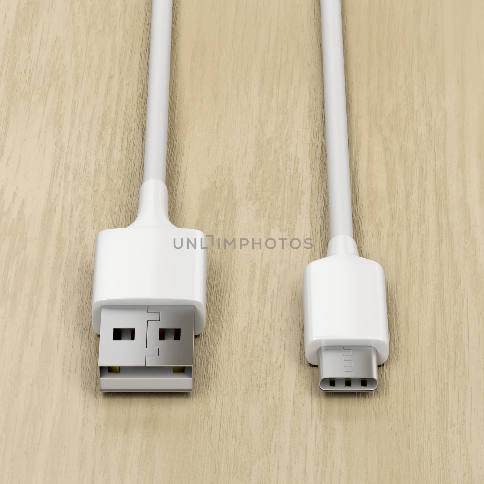 USB-A and USB-C cables on wood background