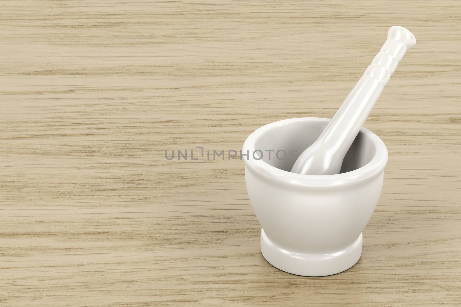 White mortar and pestle on wood table