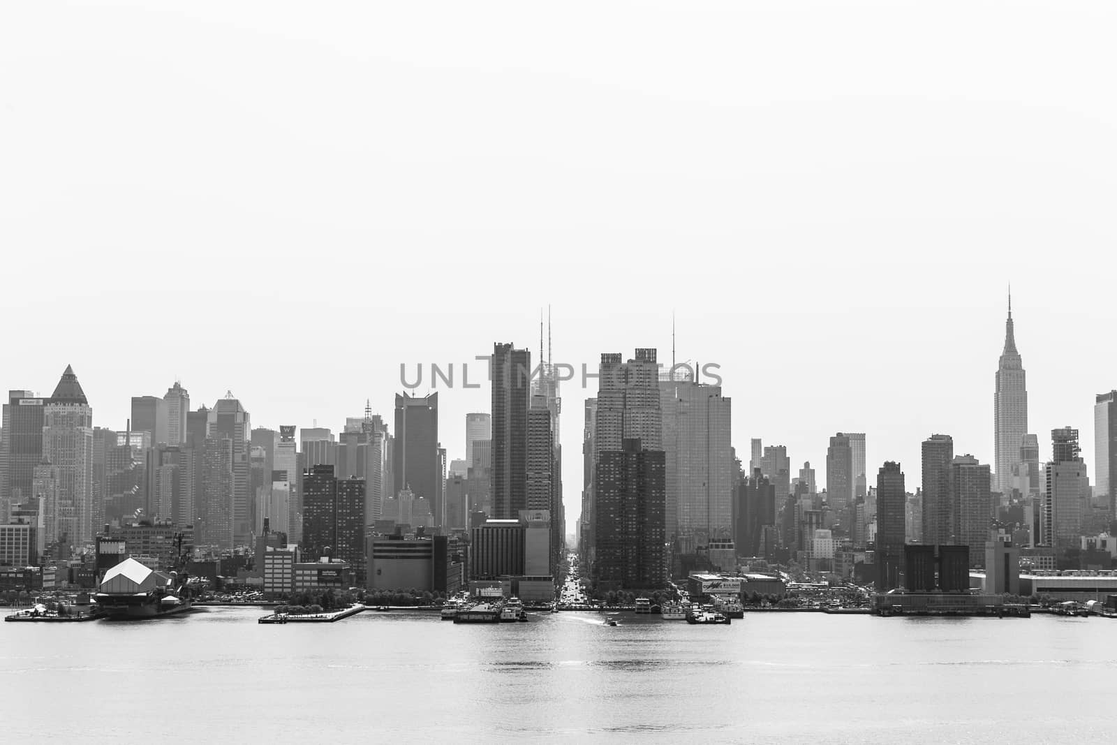 New York City midtown Manhattan skyline panorama view from Boulevard East Old Glory Park over Hudson River. by kasto