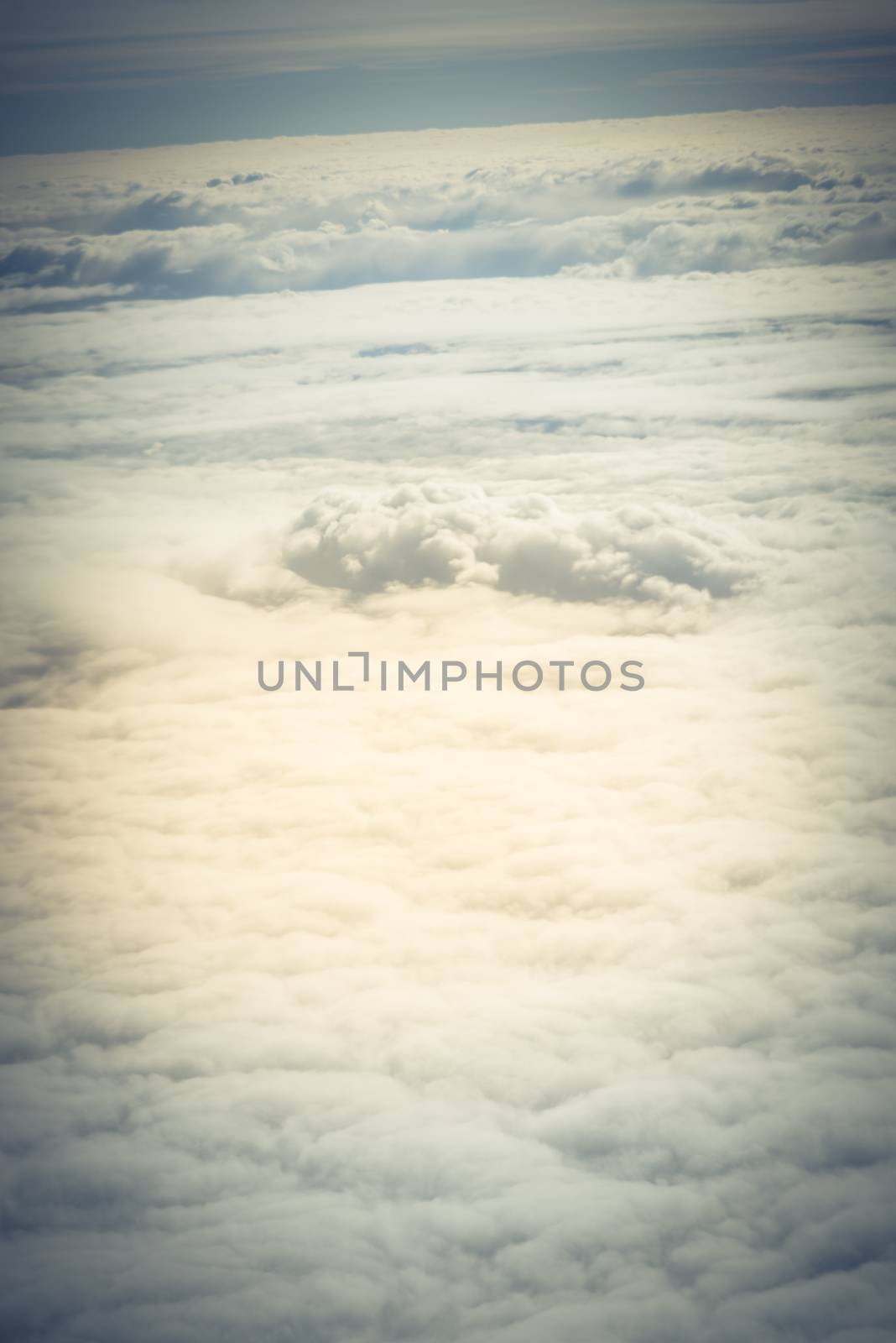 Unreal and dramatic Altocumulus cloud formation at sunrise from airplane by trongnguyen