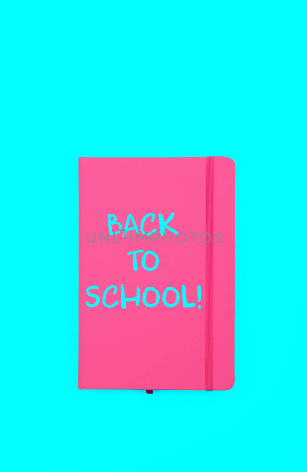 Back to school sign on pink notebook by BreakingTheWalls