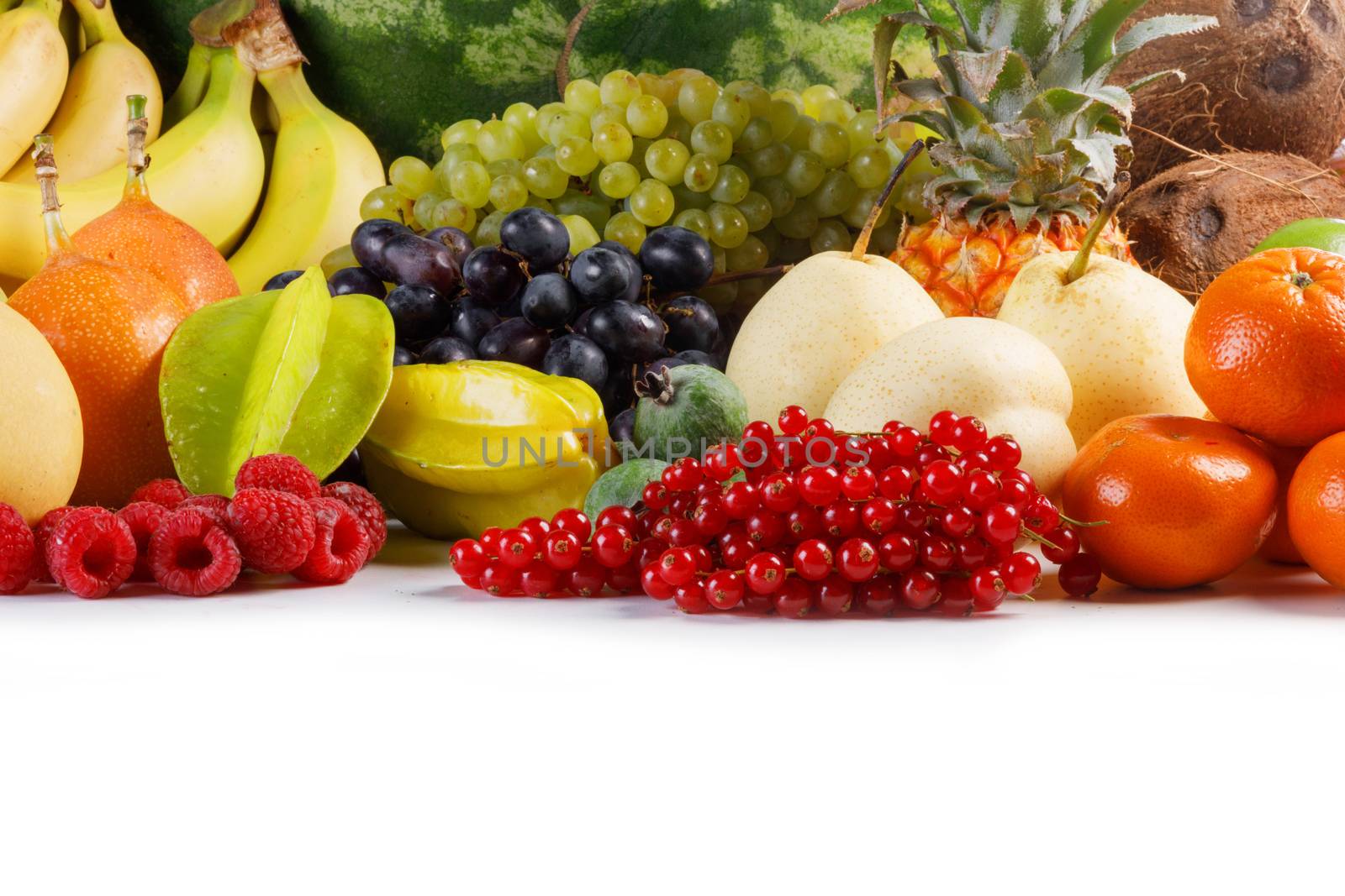 Fresh tropical fruits harvest pile isolated on white background with copy space for text