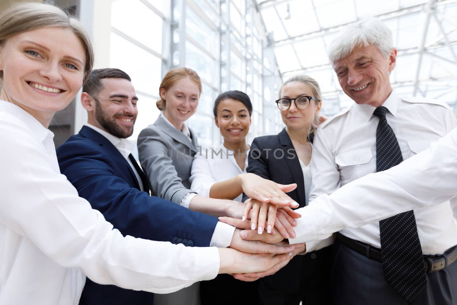 Business people happy team stack hands support concept