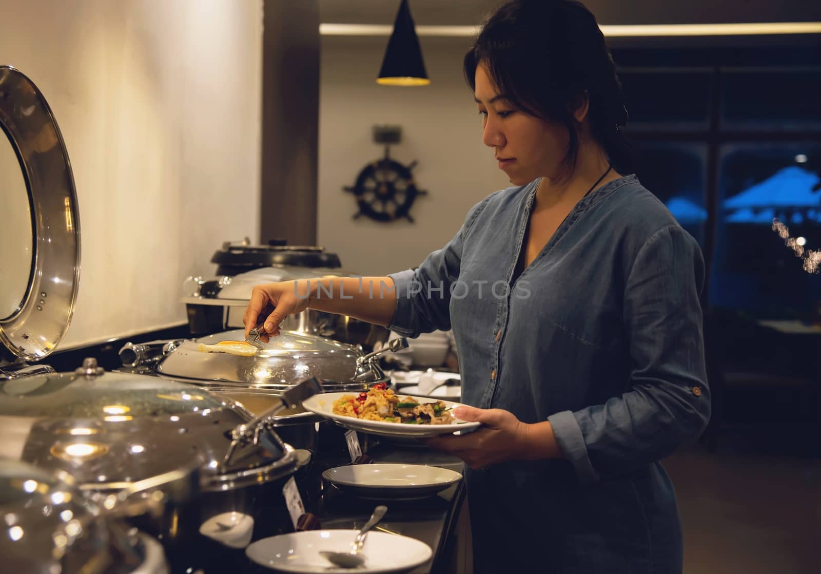 Woman eat the breakfast set in a hotel - people with breakfast in hotel concept