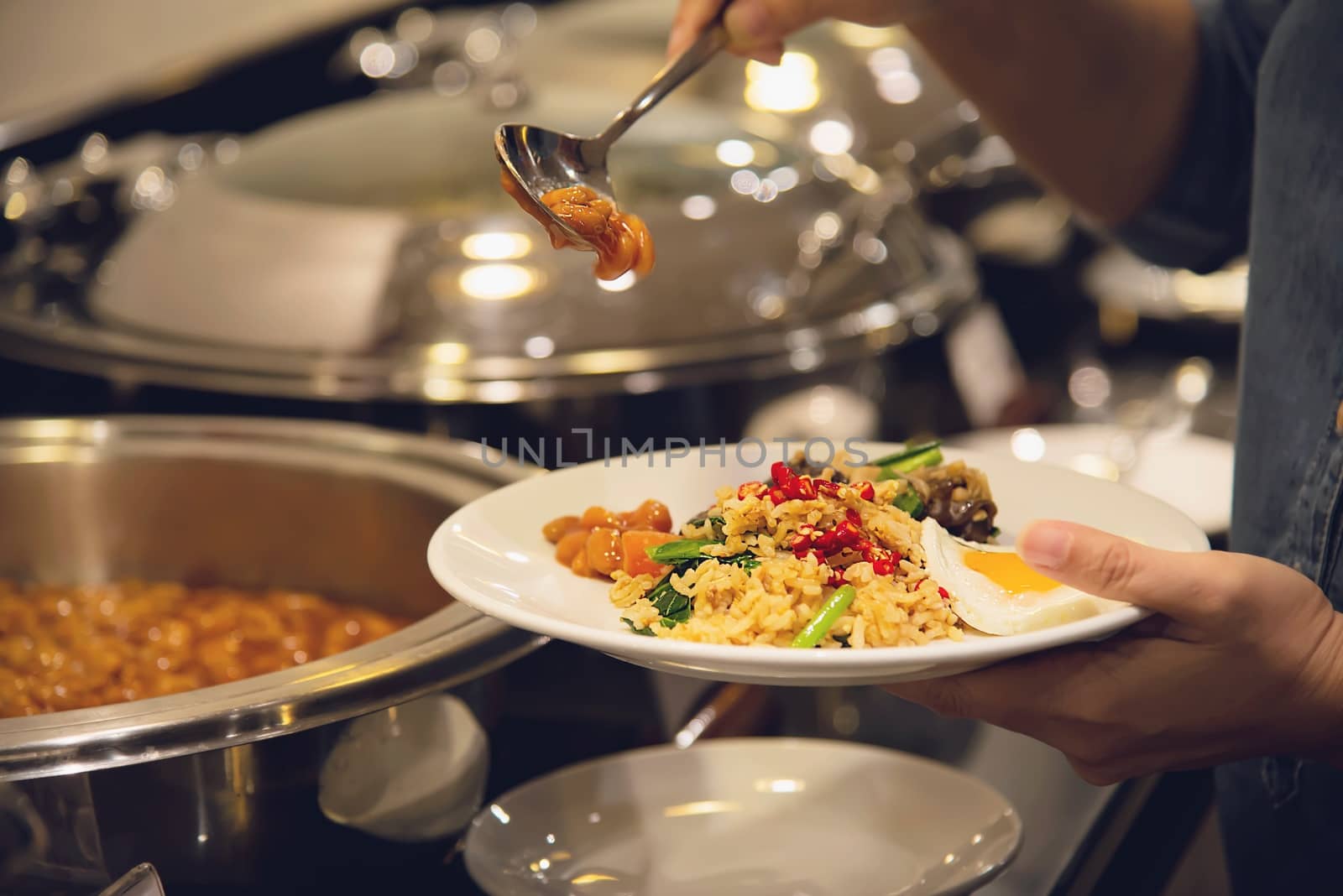 Woman eat the breakfast set in a hotel - people with breakfast in hotel concept