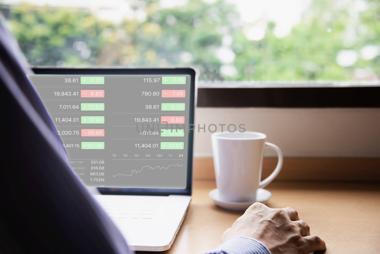 Businessman working with computer with coffee cup in the hotel room - people working lifestyle concept