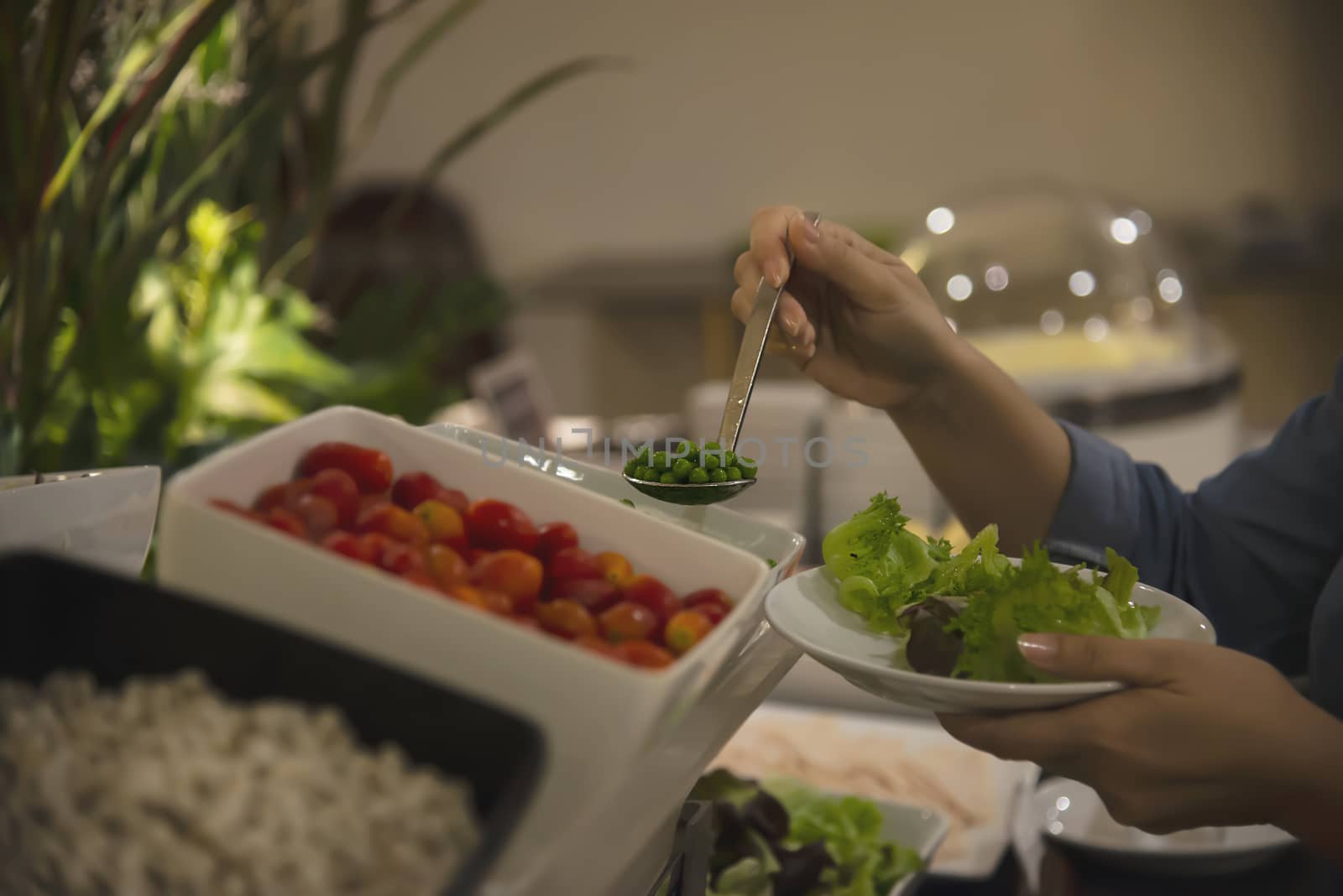 Woman eat the breakfast set in a hotel - people with breakfast in hotel concept by pairhandmade