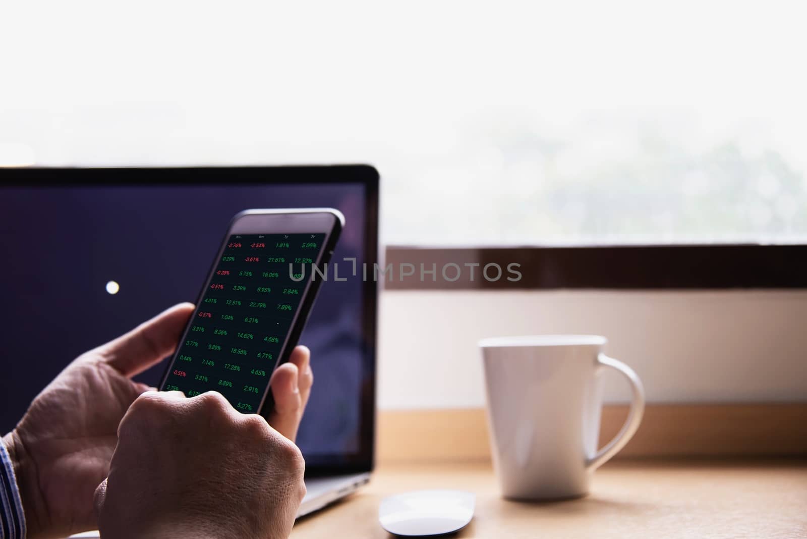 Businessman working with computer with coffee cup in the hotel room - people working lifestyle concept by pairhandmade