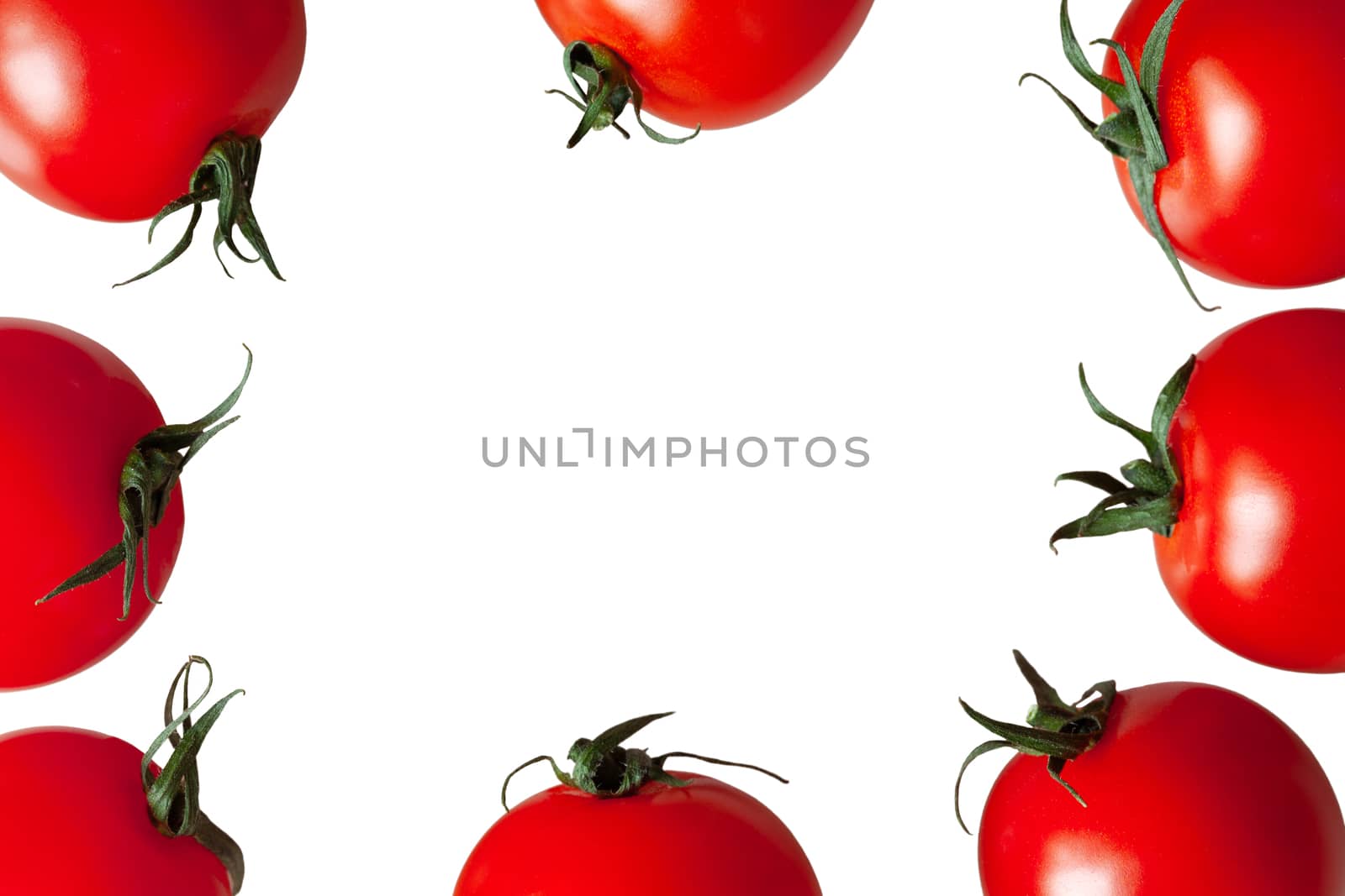 Frame of fresh cherry tomatoes isolated on white background, copy space. Macro, flat lay. Horizontal.