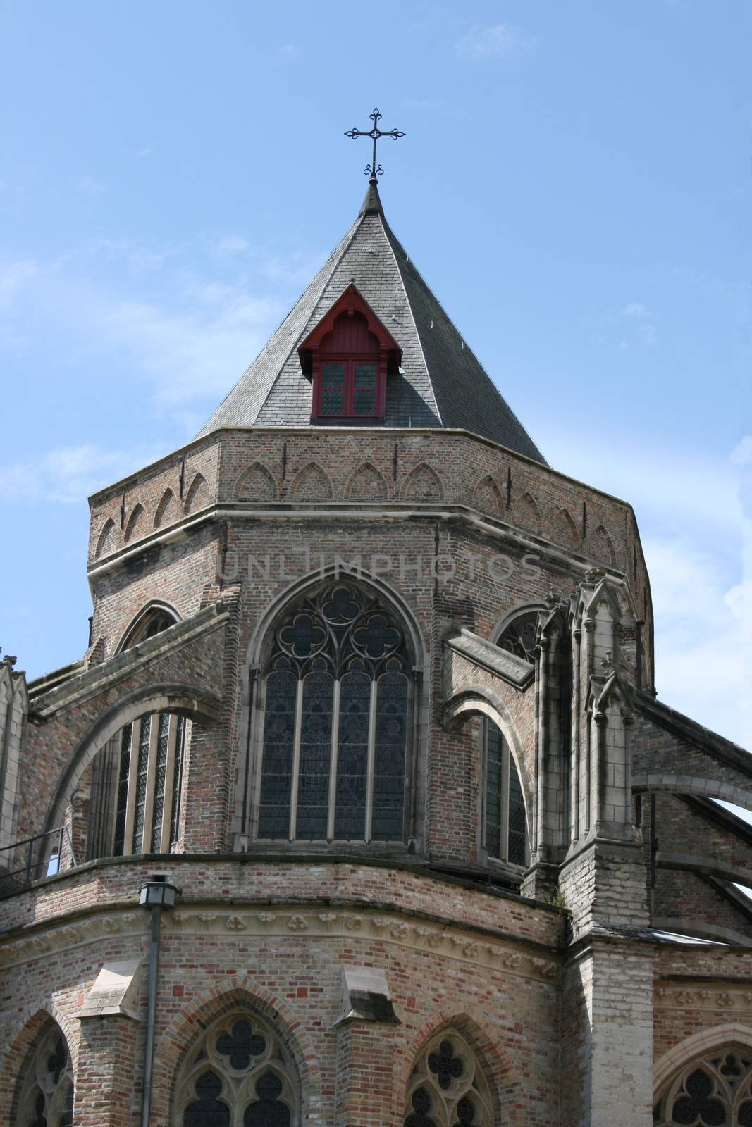 beautiful steeple, with a blue sky background  sch�ner kirchturm,mit blauem Himmel im Hintergrund by hadot