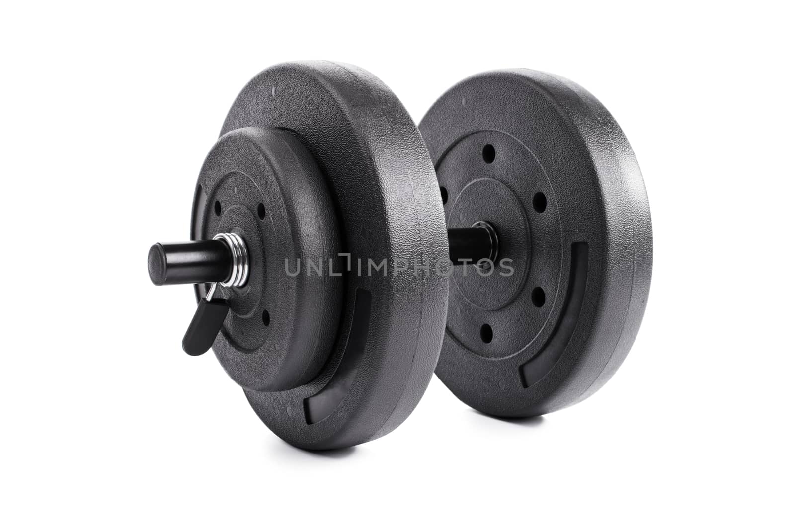 Close up shot of a dumbbell, isolated on white background.
