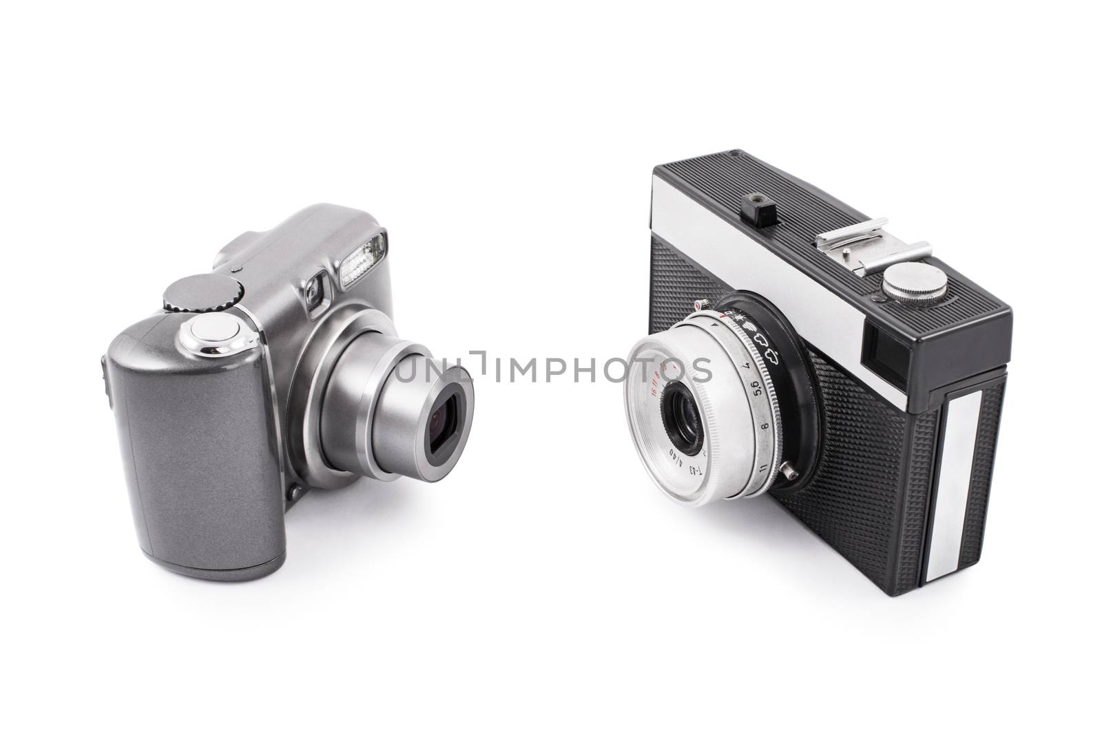 Out with the old, in with the new. Two cameras opposed to each other, old and new, isolated on white background.
