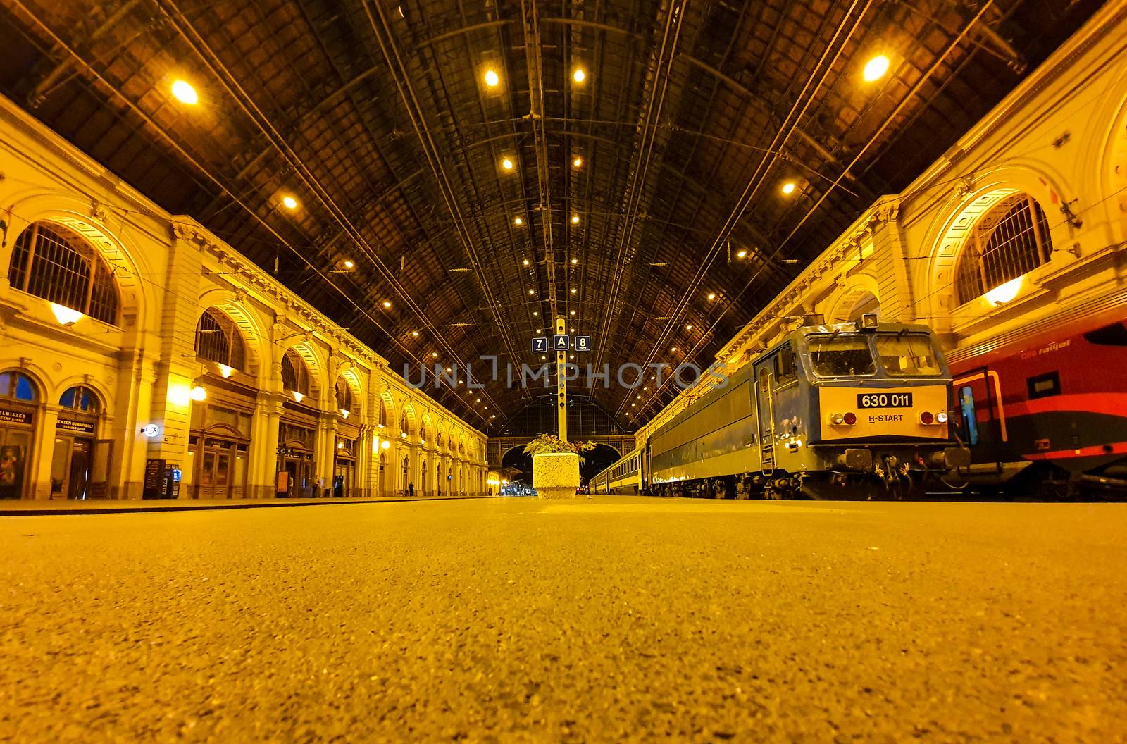 Ground view of the platforms at Keleti railway station in Budapest at night. Old trains at Keleti railway station in Budapest at night.