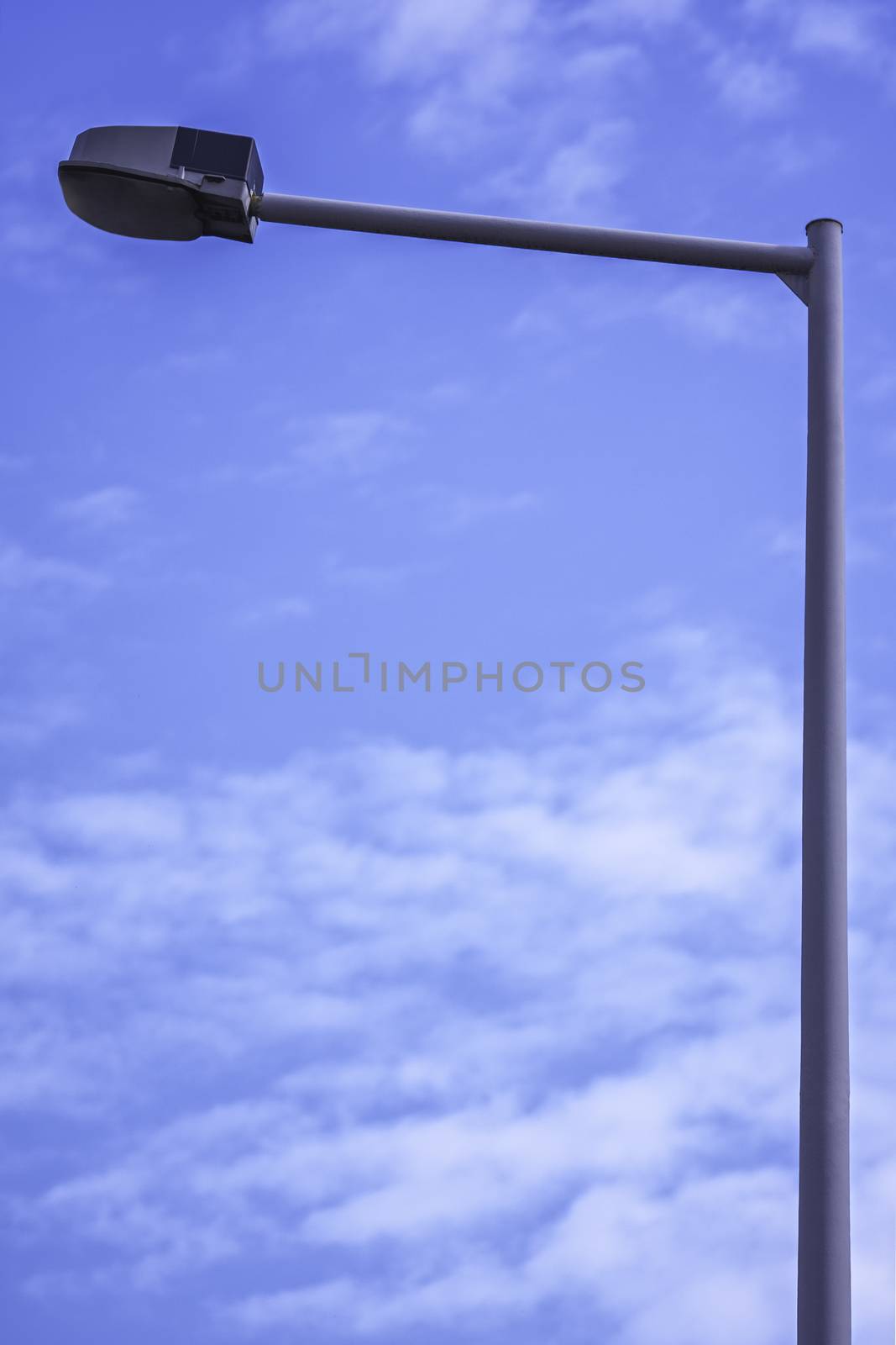 Street light and clear blue sky by Mendelex