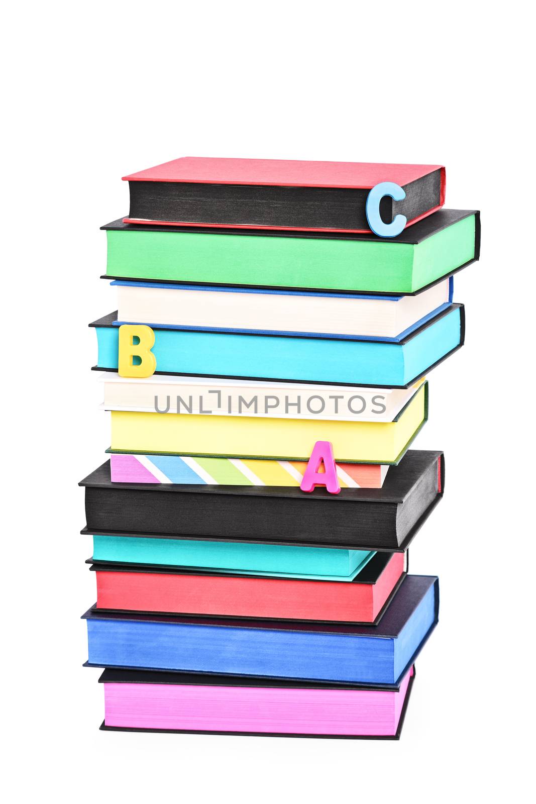 Stack of colorful books by Mendelex