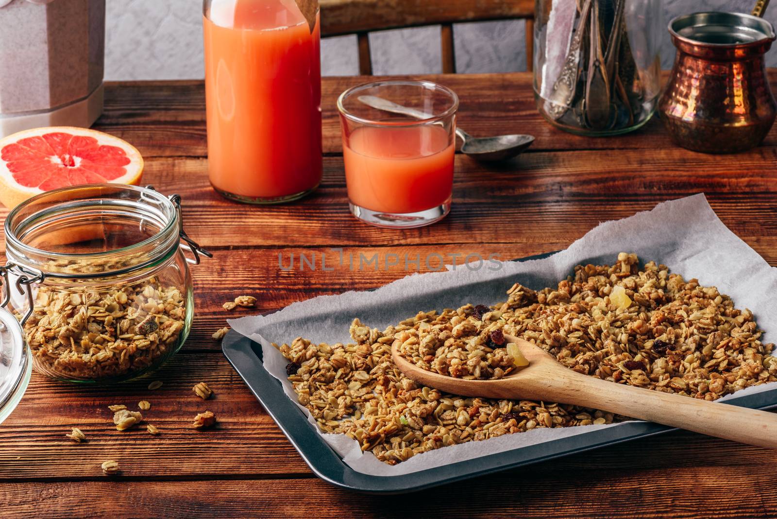 Baked granola for breakfast with grapefruit juice