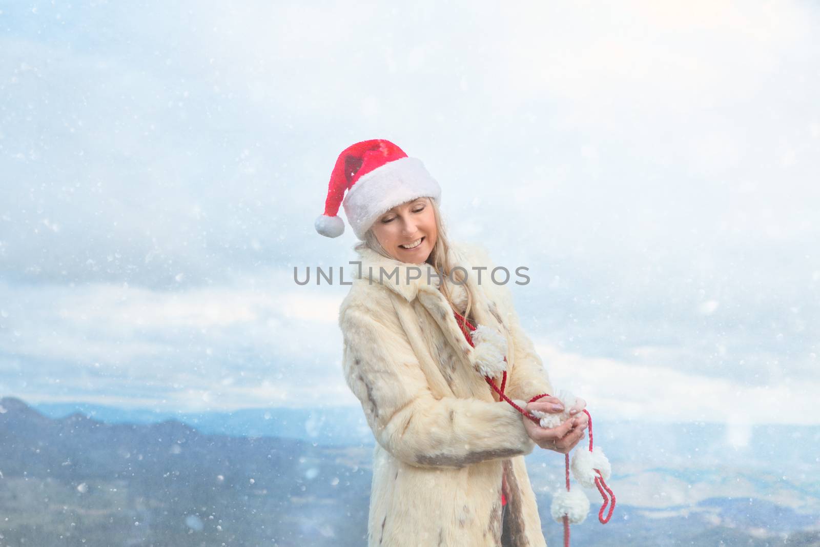 Female in a snowy wintry Blue Mountains scene celebrating Christmas.  Christmas in July, Christmas holiday themes