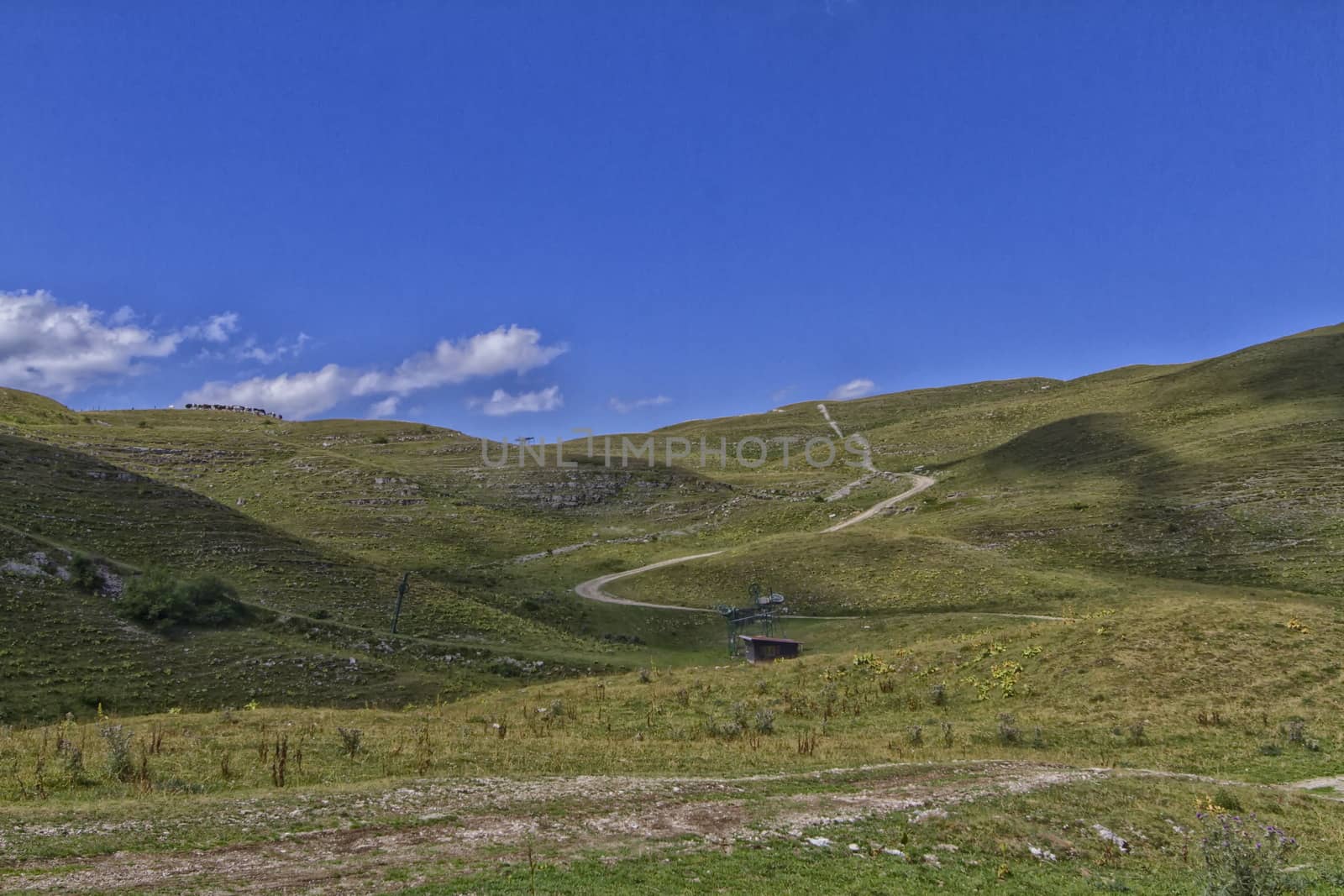 mountain panorama with a beautiful blue sky and clouds