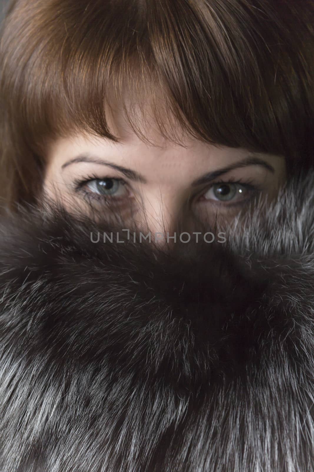 The eyes of a girl in a fur collar by sergeizubkov64