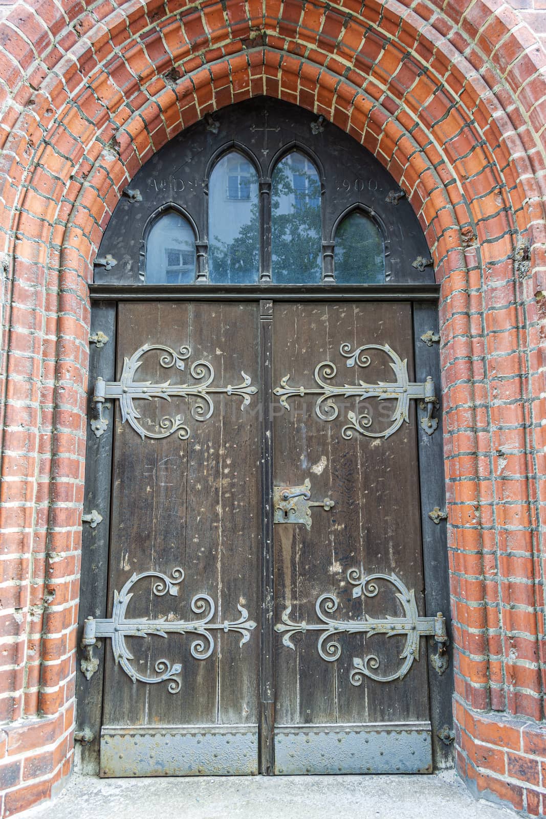 Door of an old building in Berlin by ankarb