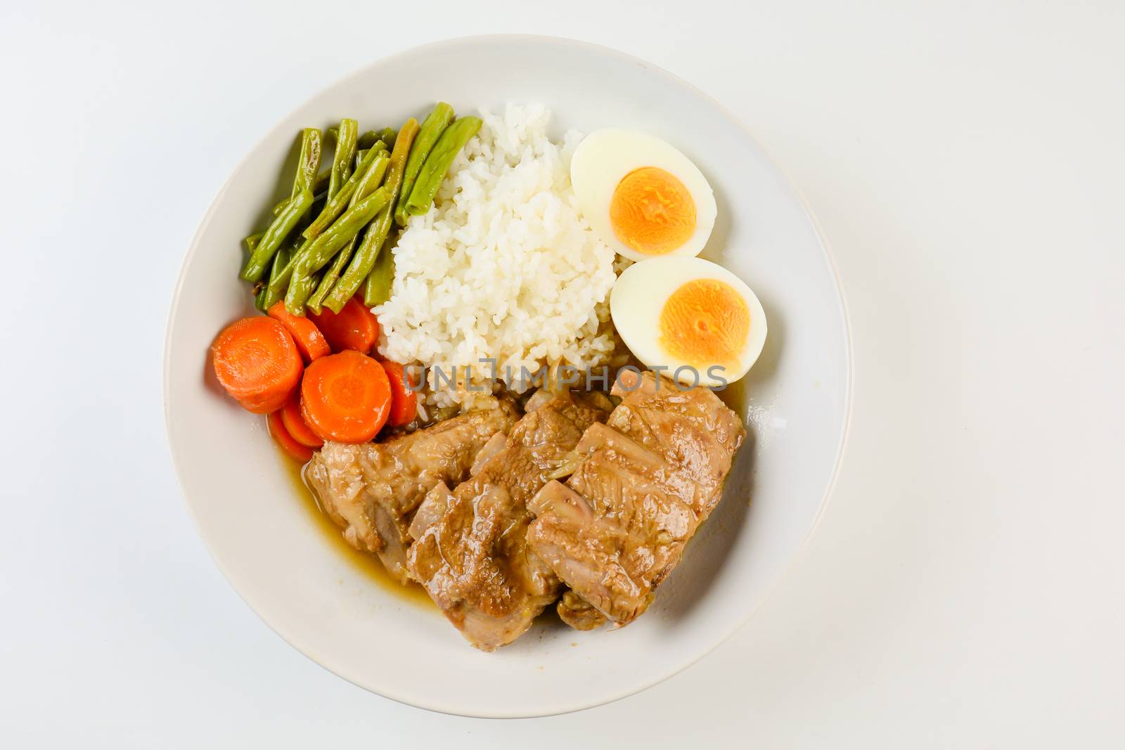Baked pork ribs with rice, boiled egg and vegetable by yuiyuize