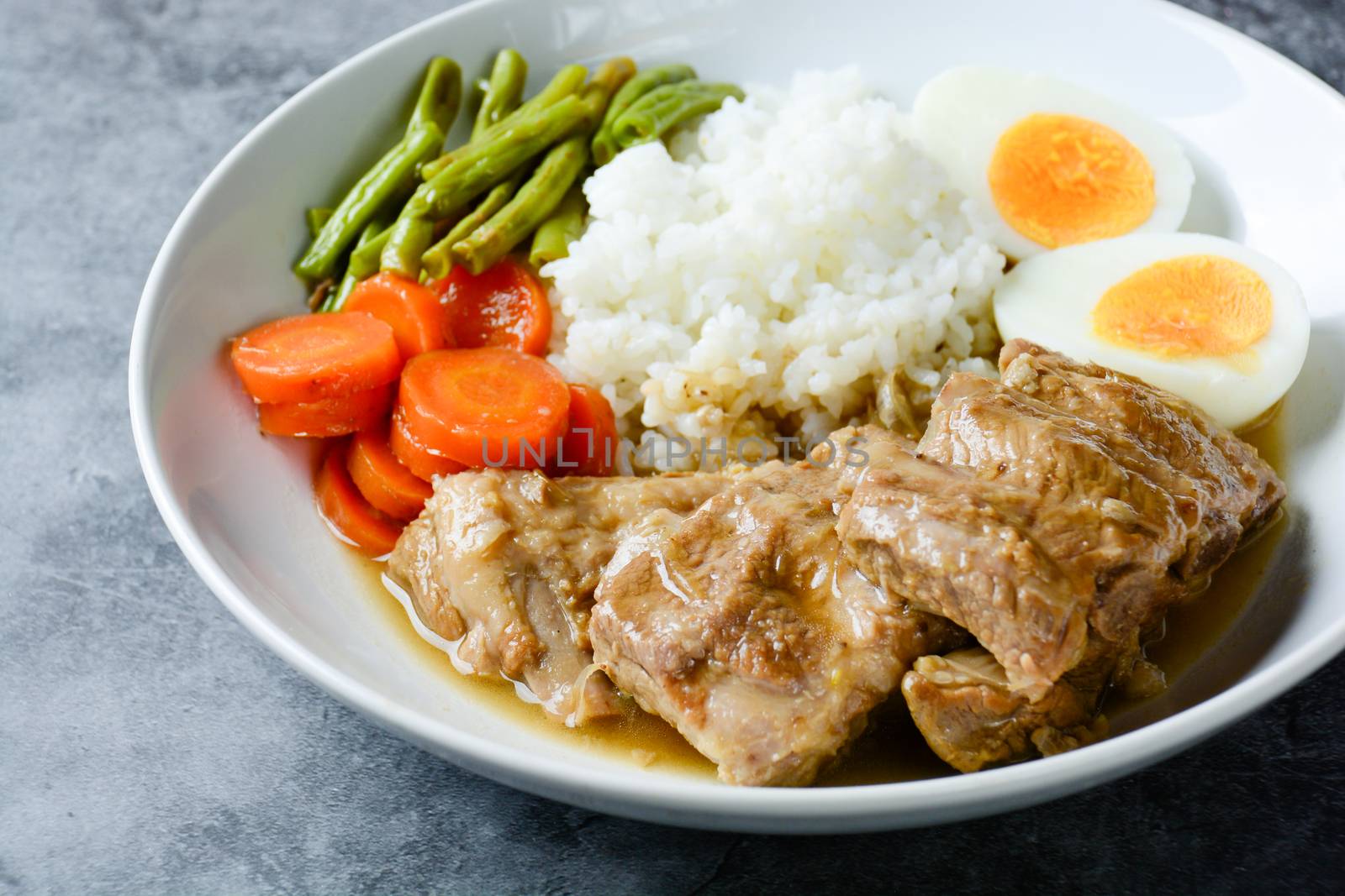 Baked pork ribs with rice, boiled egg and vegetable by yuiyuize
