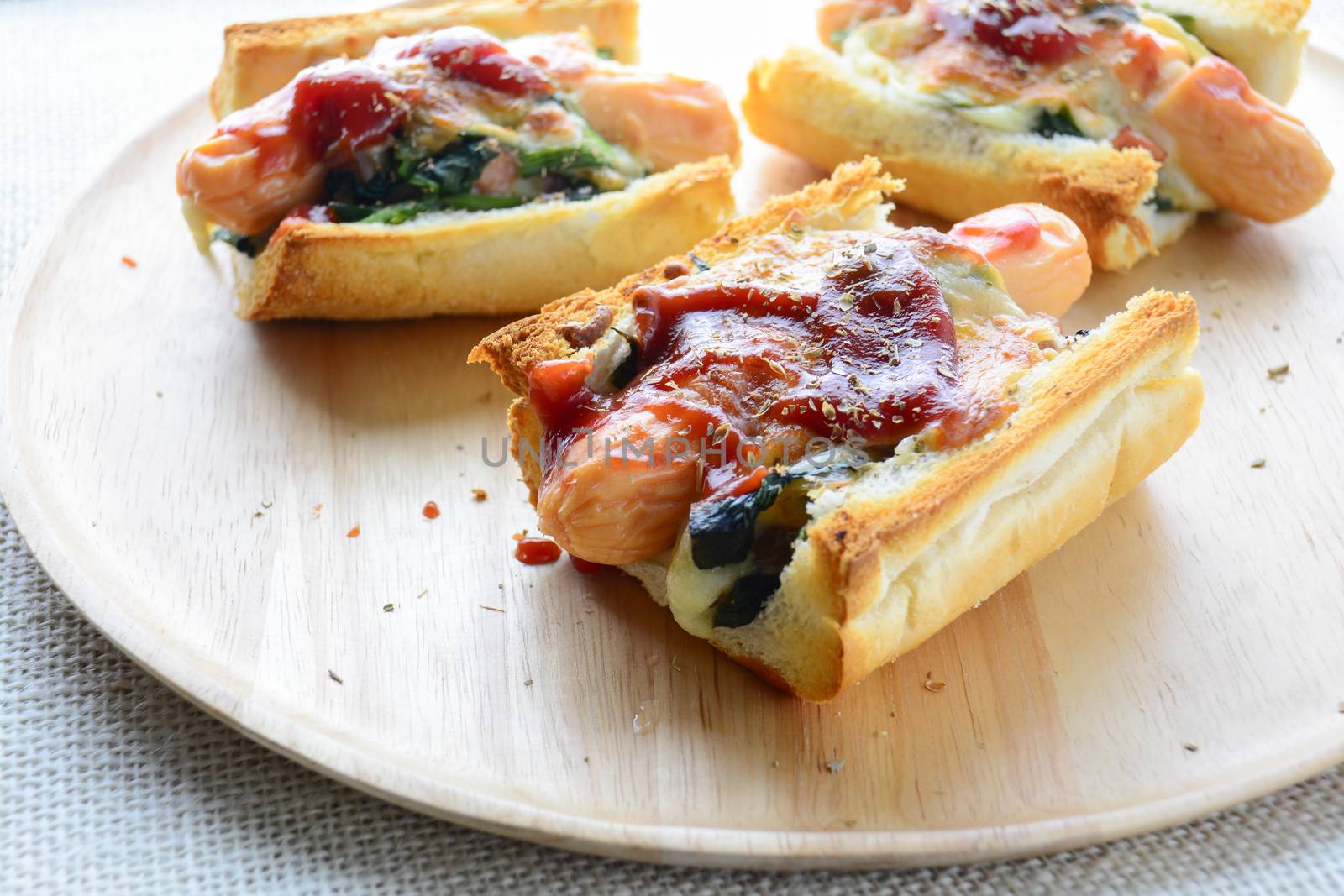Baked Spinach with Cheese, sausage on Baguette, French bread
