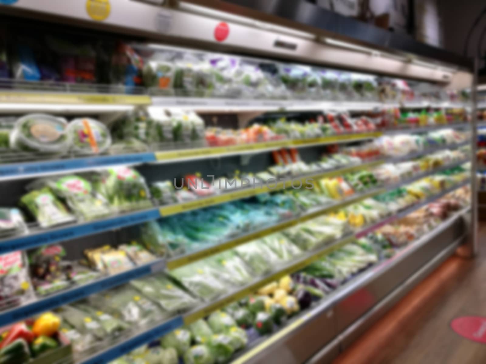 Blurred of product shelves in supermarket or grocery store, use  by yuiyuize