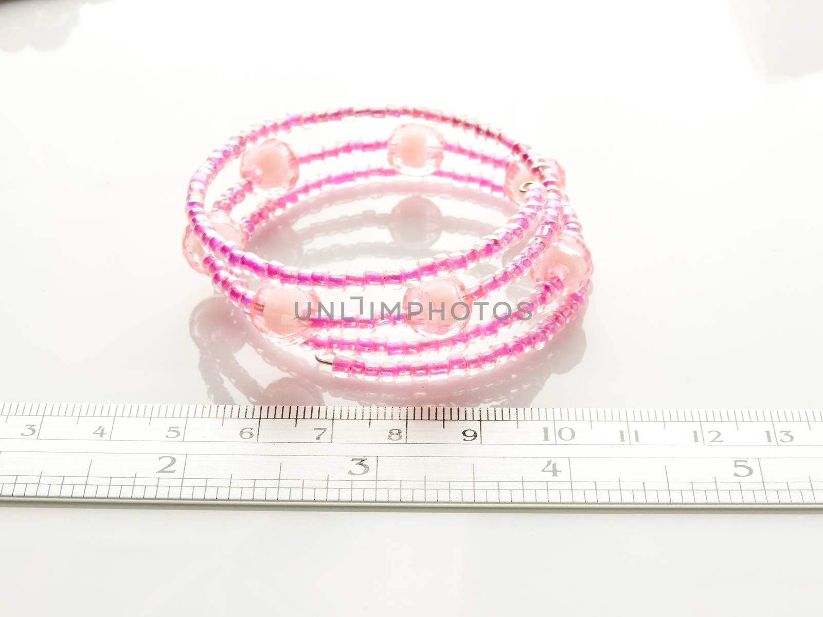 Multi-colored bracelets with beads. Colourful child's bead brace by yuiyuize