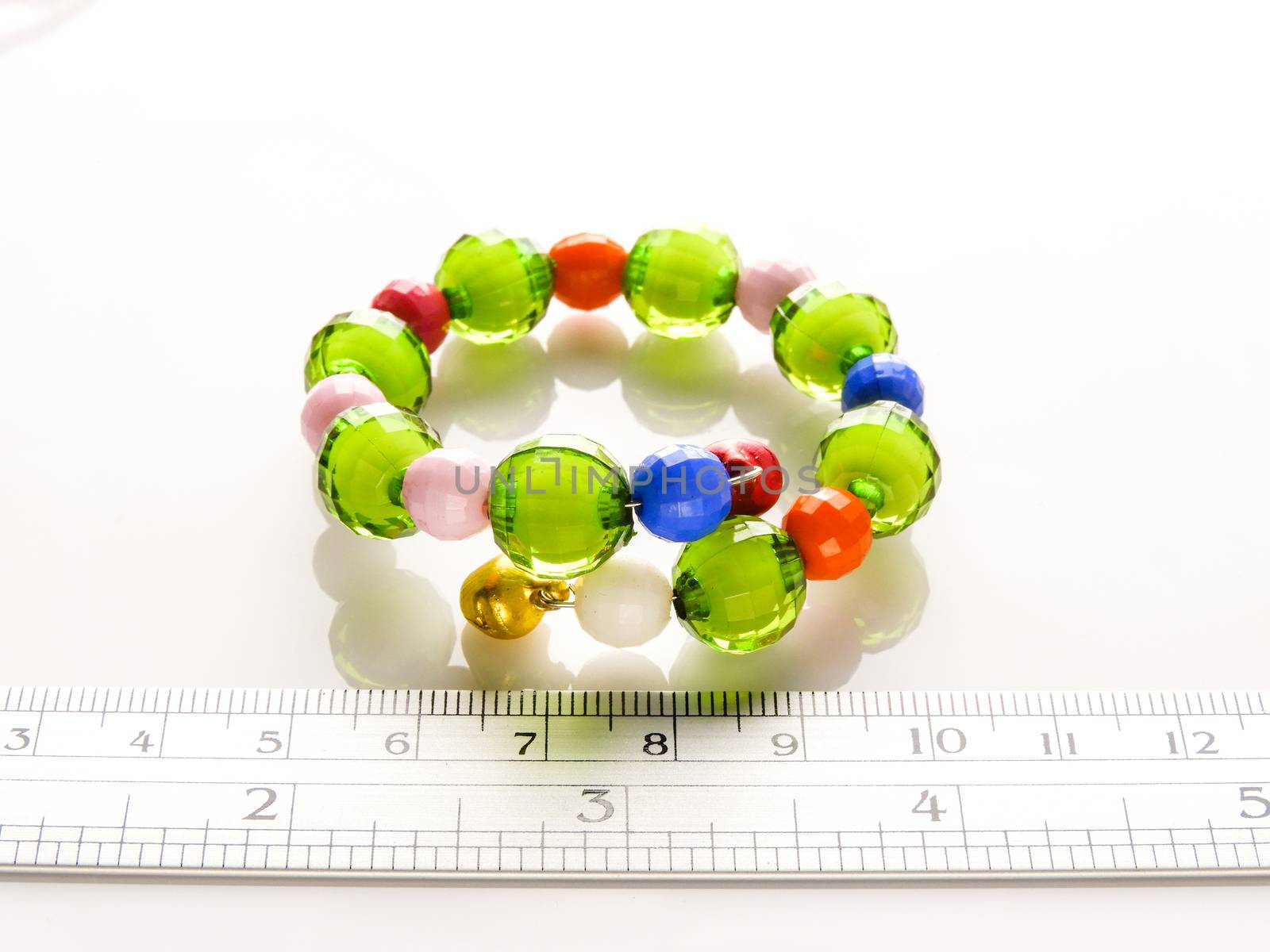 Multi-colored bracelets with beads. Colourful child's bead bracelet.
