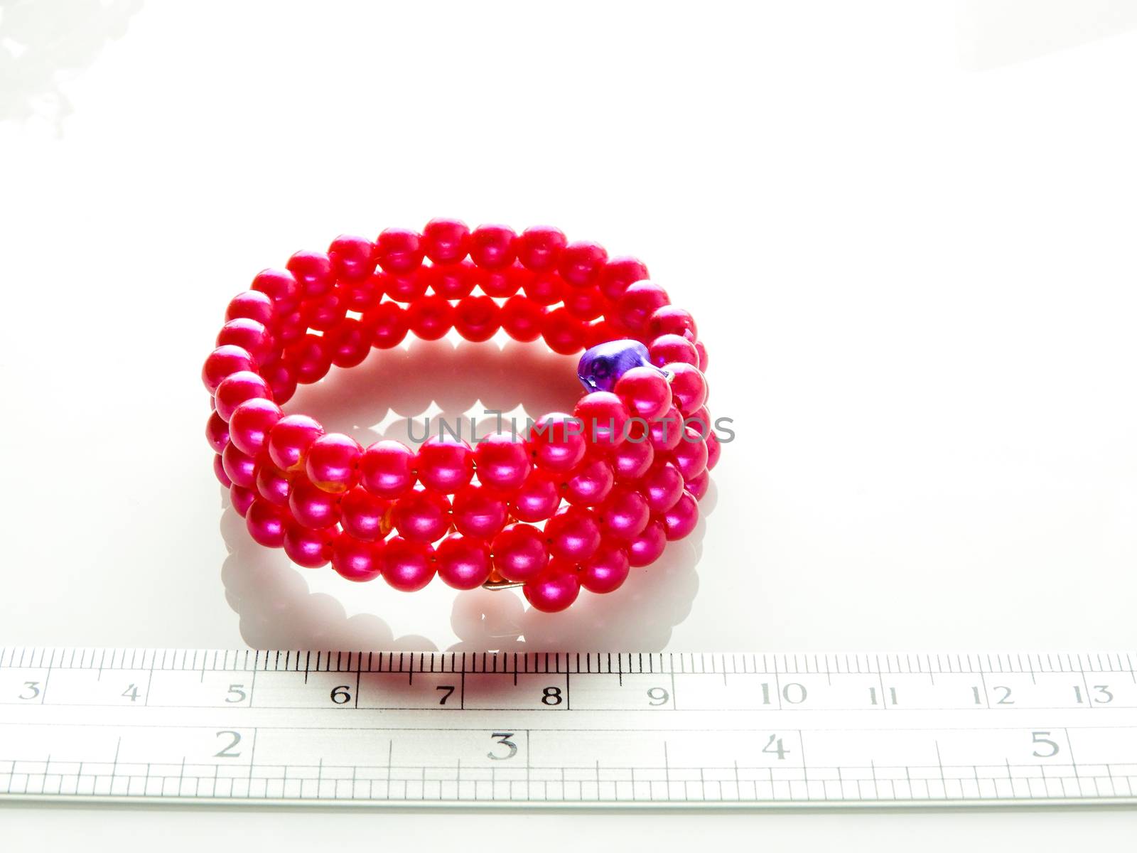 Multi-colored bracelets with beads. Colourful child's bead bracelet.
