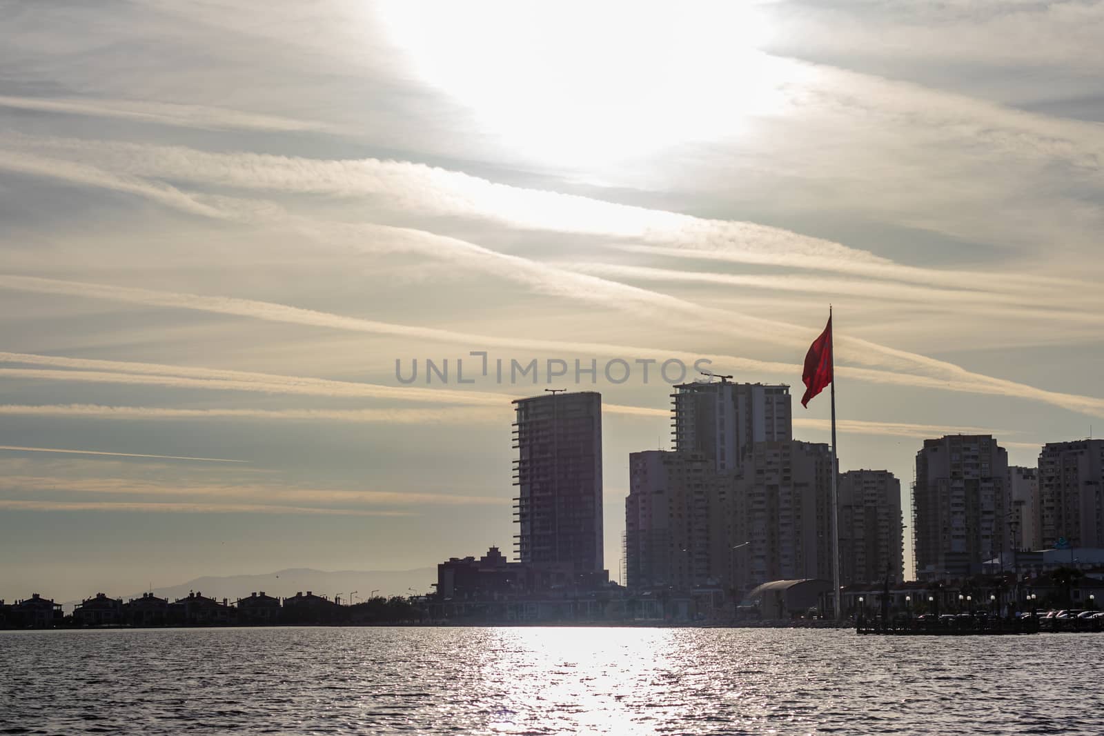 a cityscape shoot with low shutter speed - sun is shining above. photo has taken at izmir/turkey.