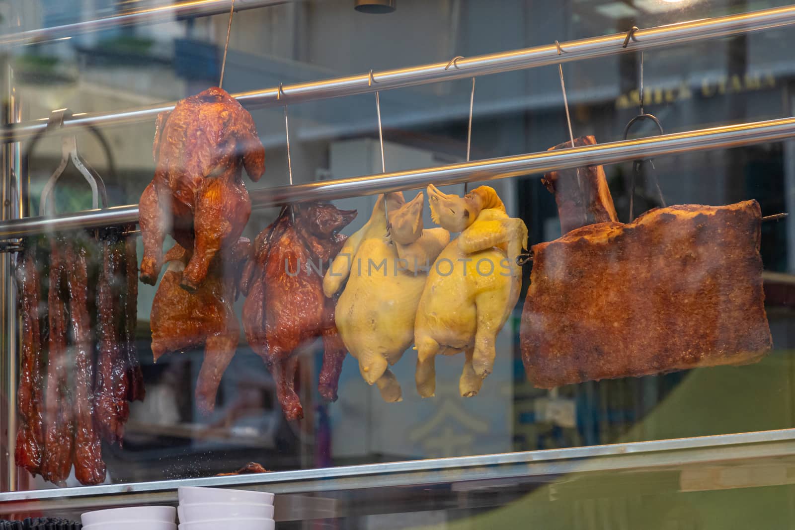 Cooked chickens on street food market in Kuala Lumpur