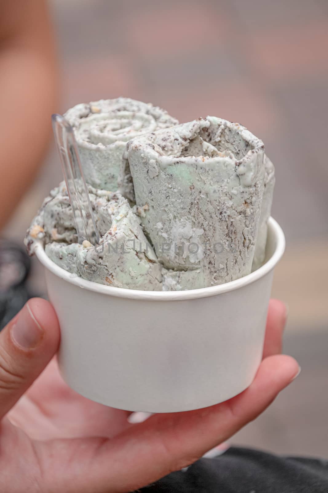 Pan frozen ice cream on Malaysian street food market after eight flavor