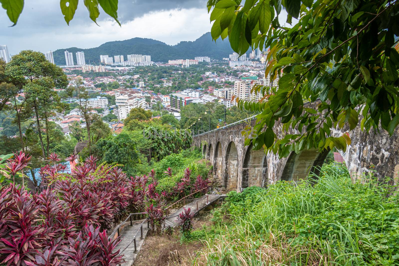 Penang Hill heritage trail walking down from top towards George Town in Malaysia by MXW_Stock