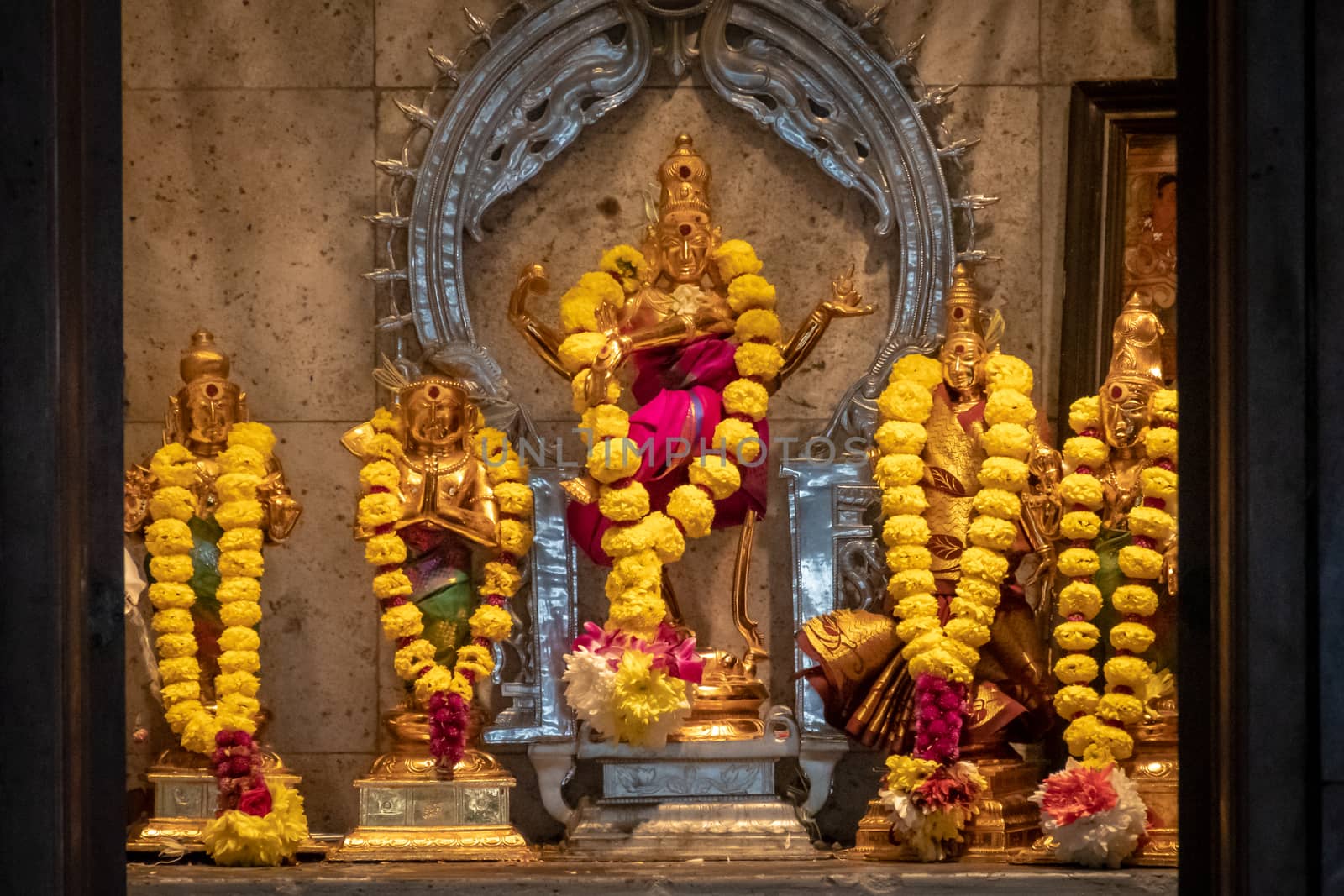 Sri Mahamariamman Temple golden statues in most holy room of Hindu temple in Kuala Lumpur by MXW_Stock