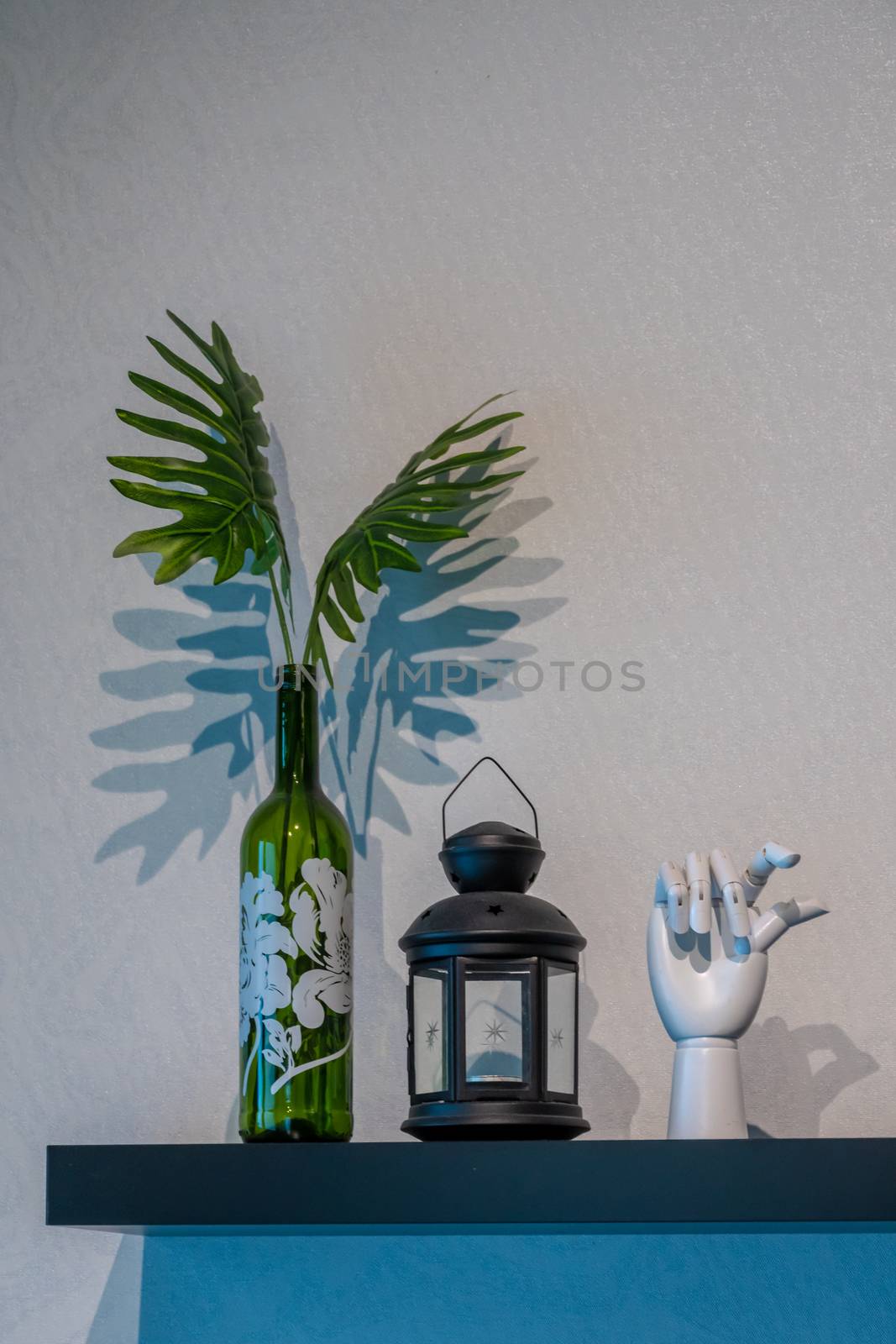 Room decoration modern style glass bottle, hand and leaves
