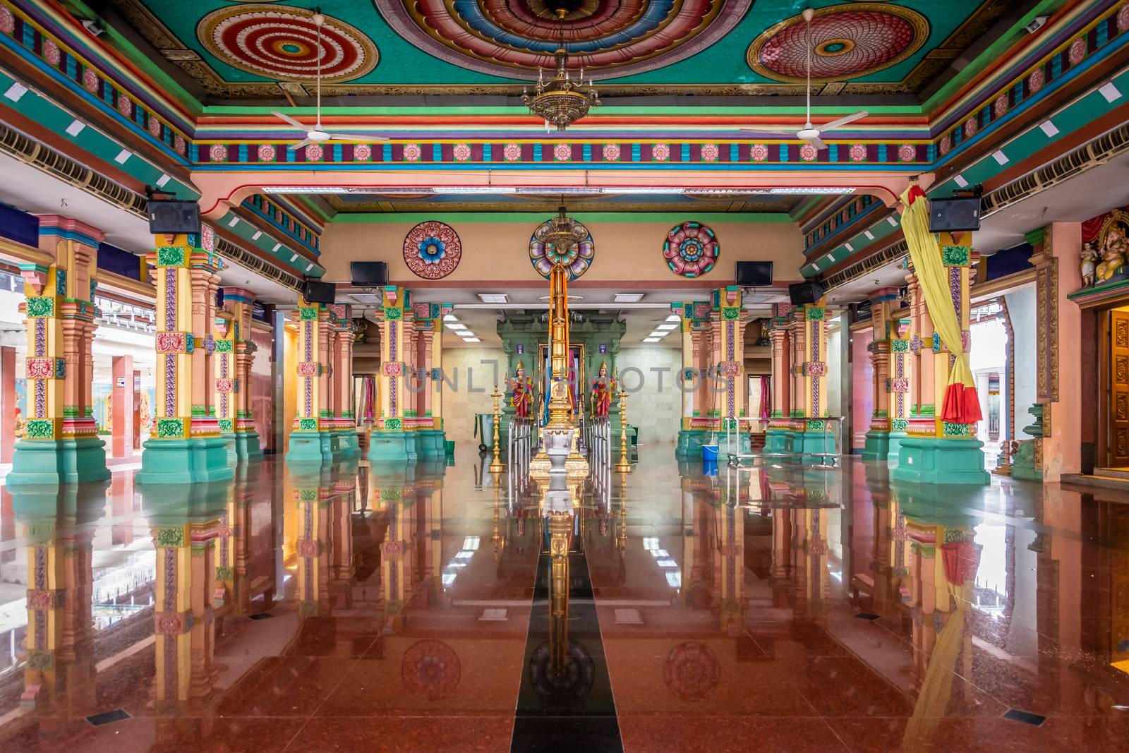 Sri Mahamariamman Temple colorful main room of Hindu temple in Kuala Lumpur by MXW_Stock