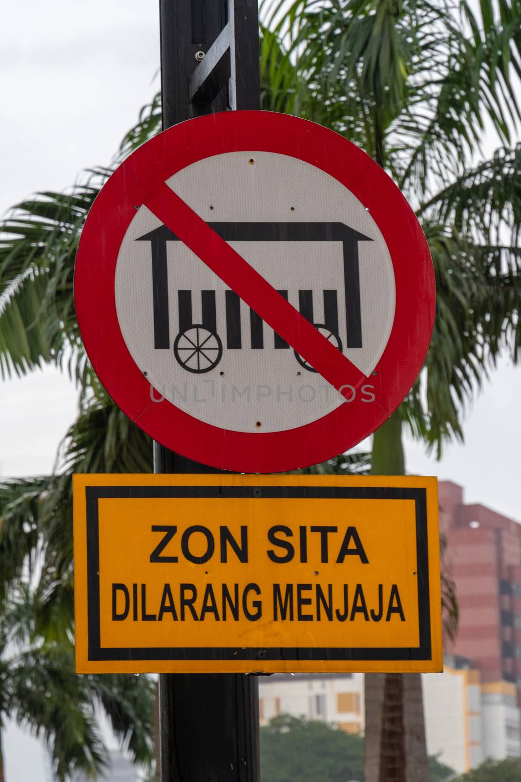 Street sign forbidding street food stands in Kuala Lumpur by MXW_Stock