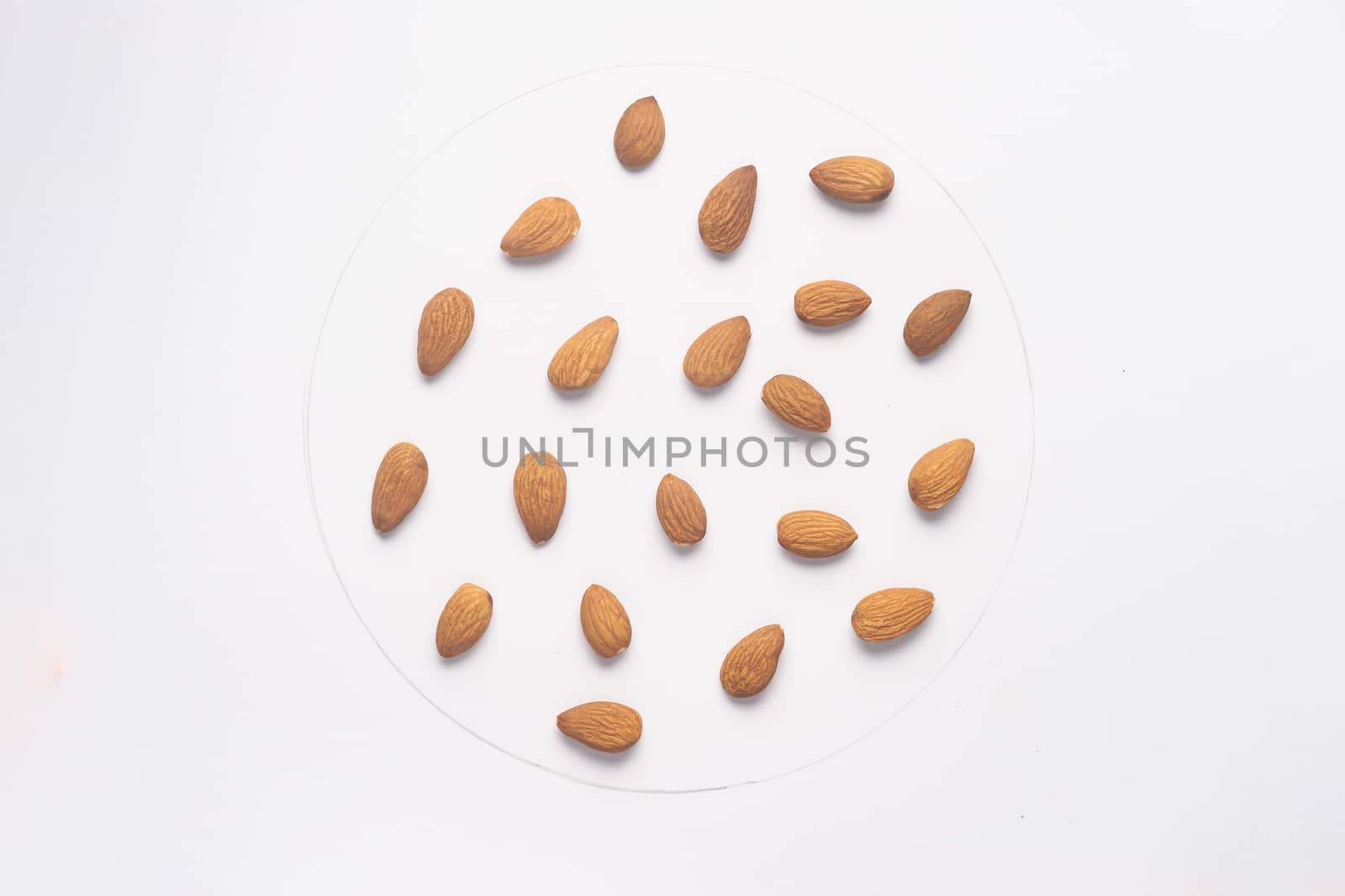 Almond nuts isolated on white backgroud.  by alexsdriver