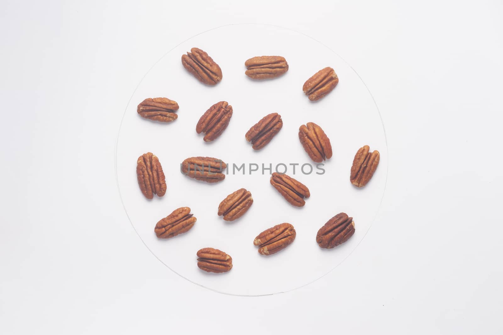 Pecan nuts isolated on white backgroud. 