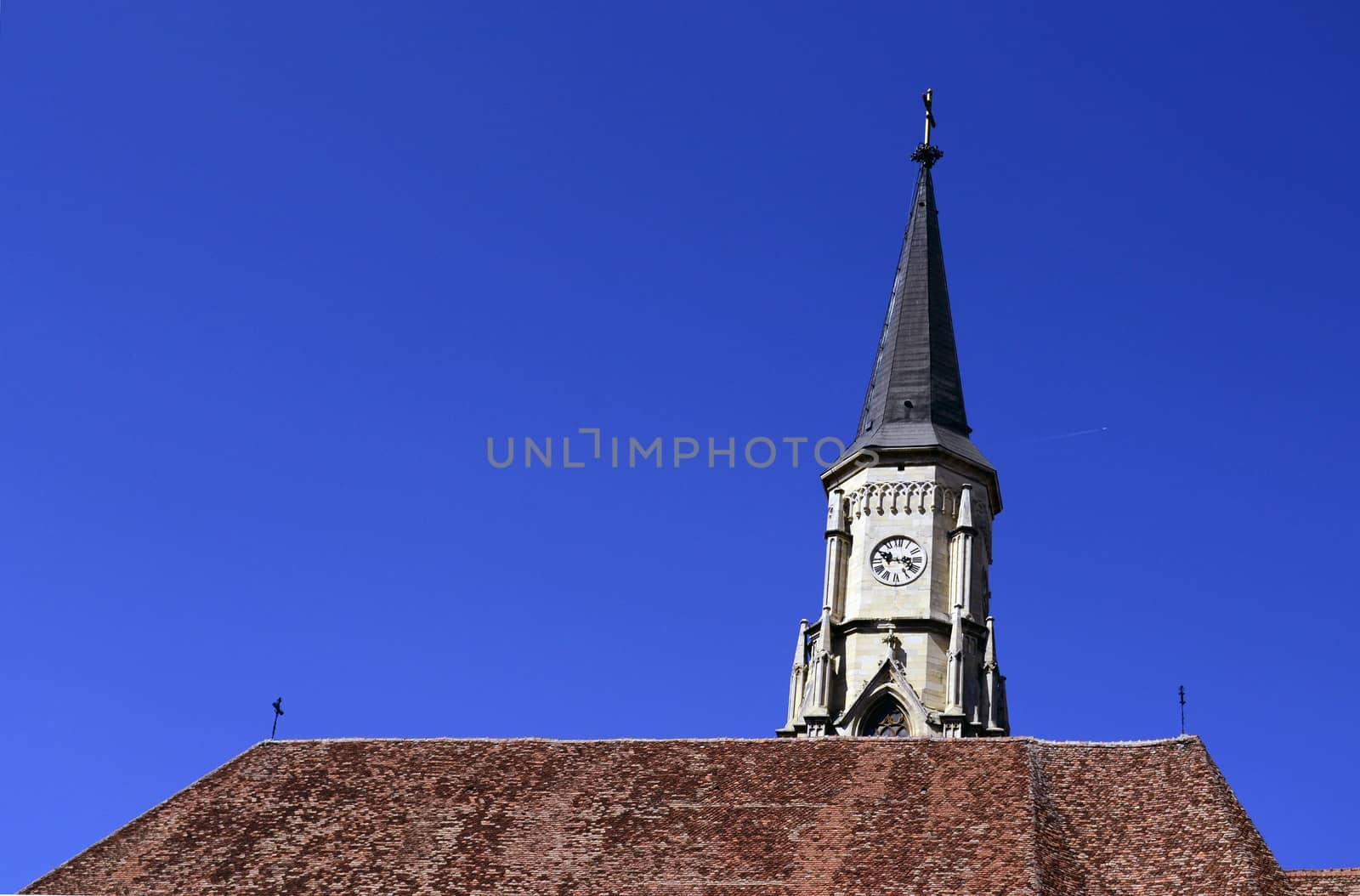 Old church roof with clock tower