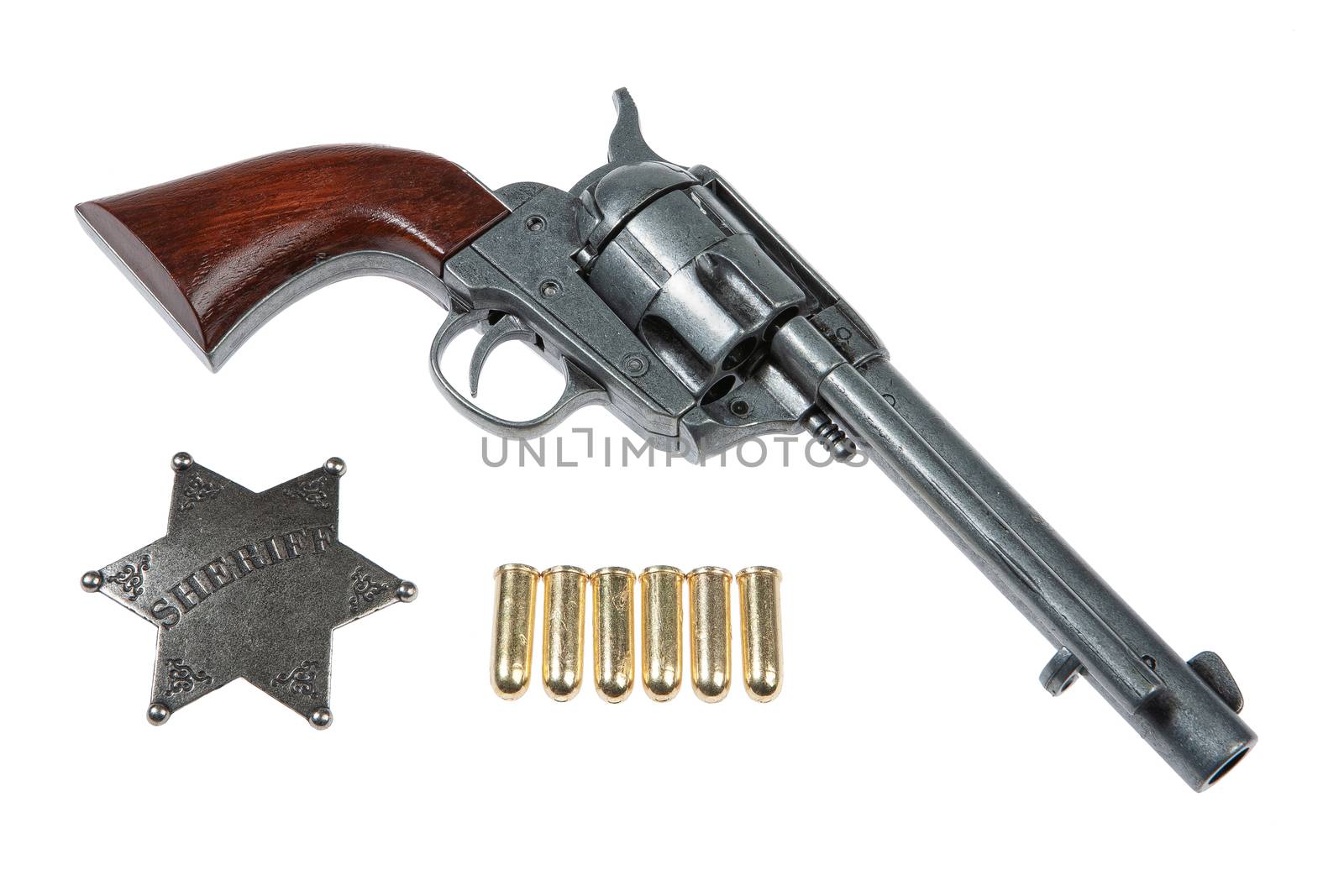 Old revolver on an isolated studio background