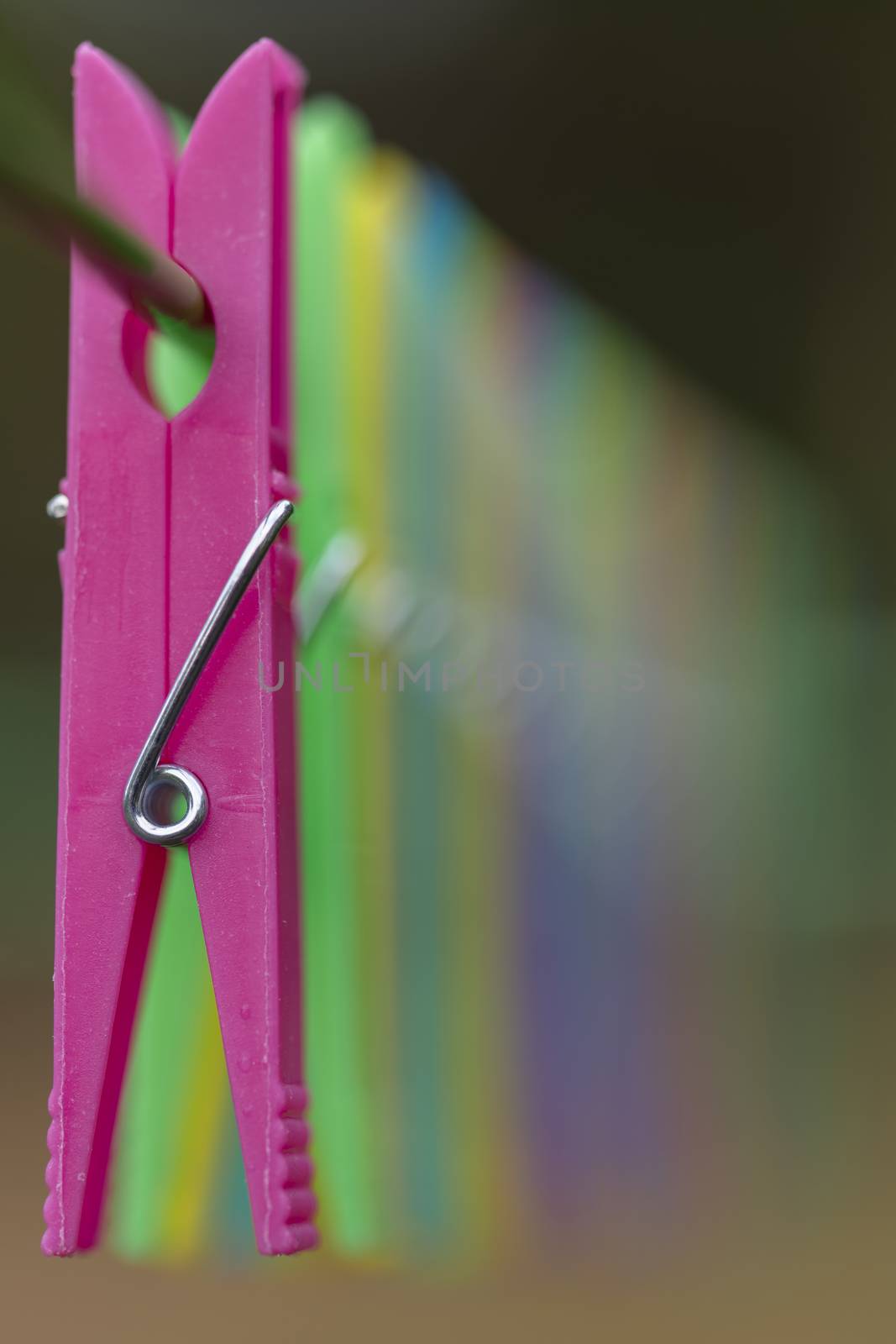 Colored clothespins in blur
 by Tofotografie