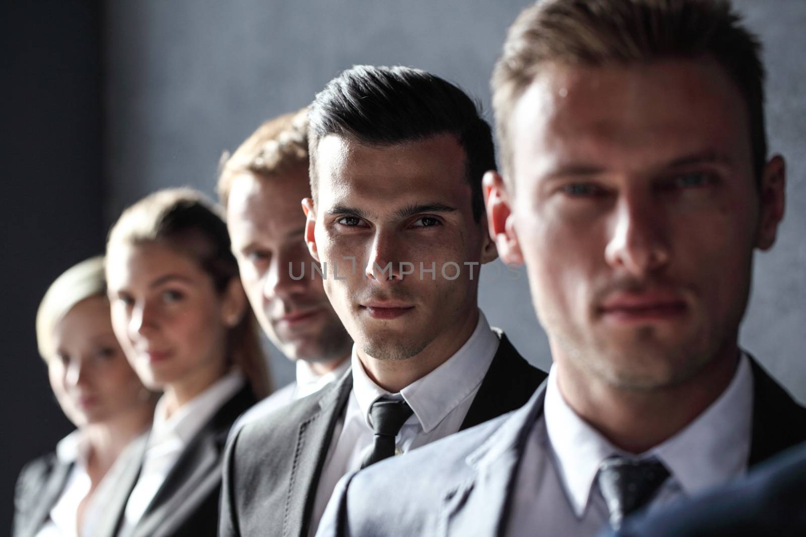 Group of business people standing in a row