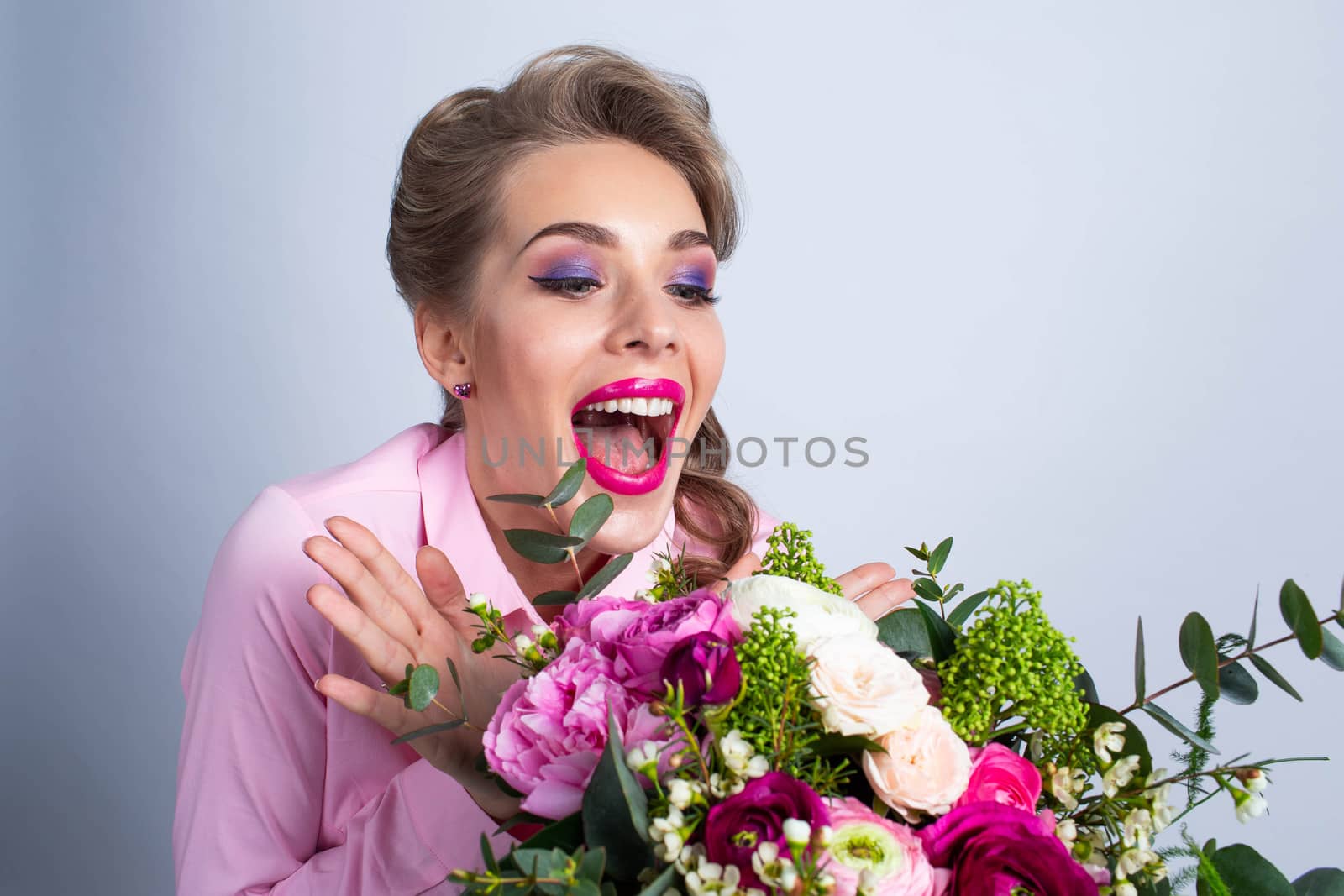 Woman happy and excited of flowers by ALotOfPeople