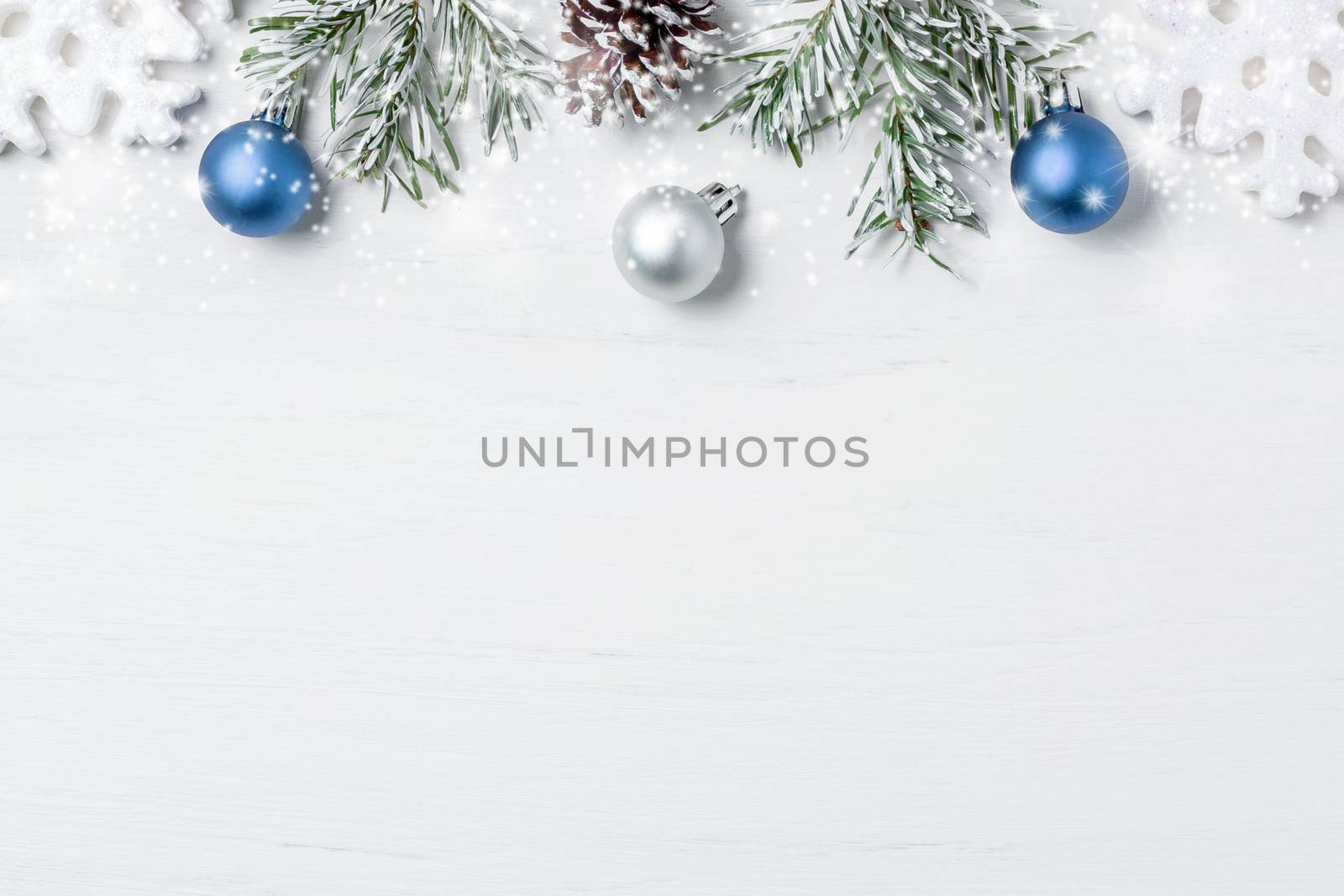 Bright Christmas composition, blank for design - snowflakes, Christmas tree branches and cones, copy space, place for text, flatlay.