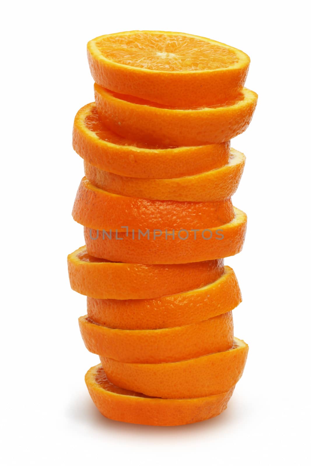 Stack of orange slices on white by destillat