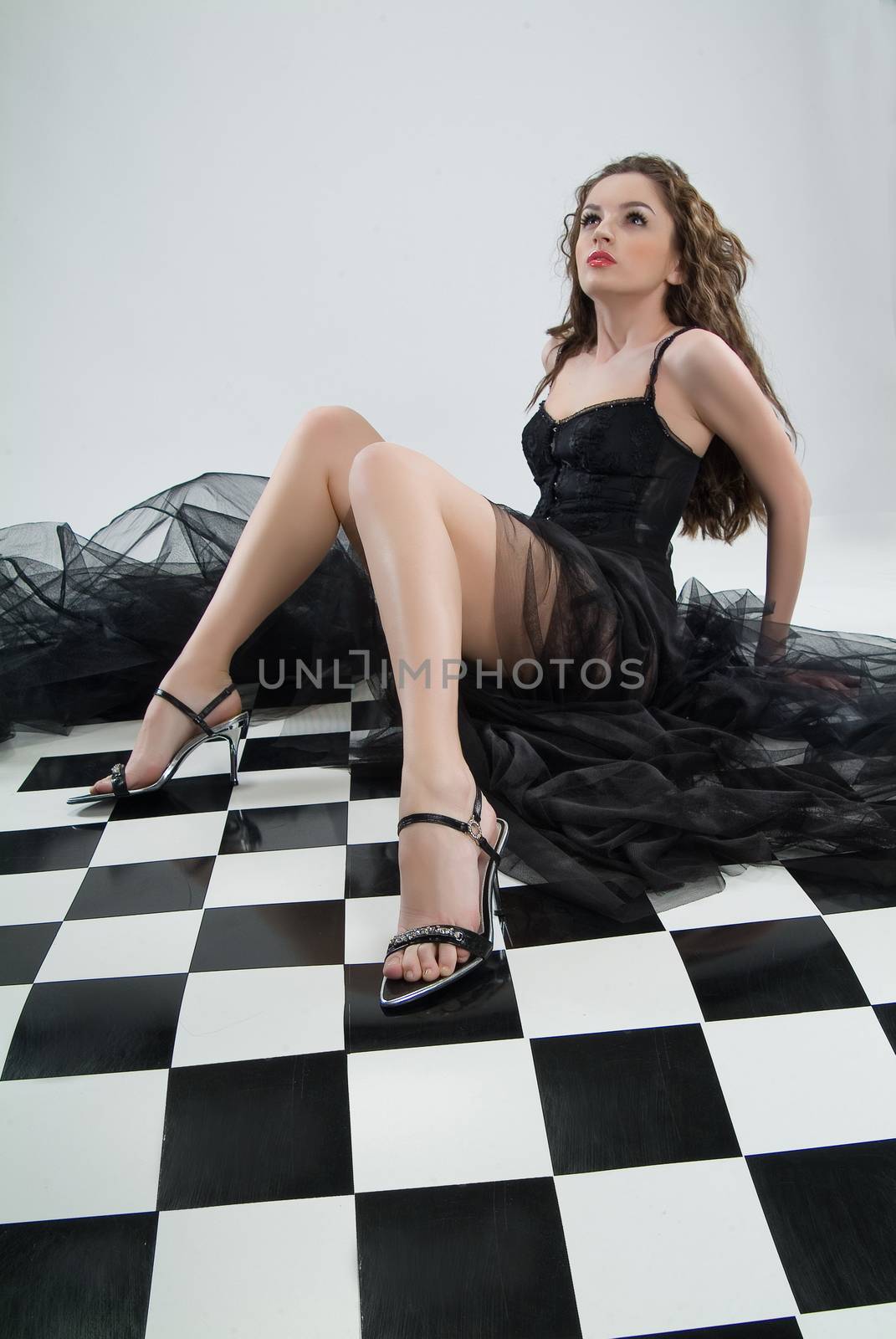 Young beautiful woman in a fashionable clothing